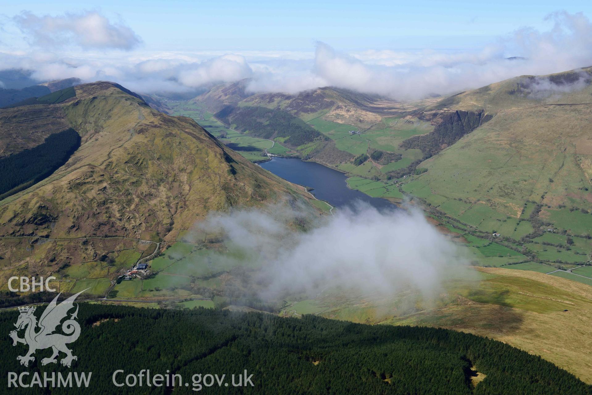 Tal-y-llyn Lake, mountain landscape from east. Oblique aerial photograph taken during the Royal Commission’s programme of archaeological aerial reconnaissance by Toby Driver on 20 April 2018.