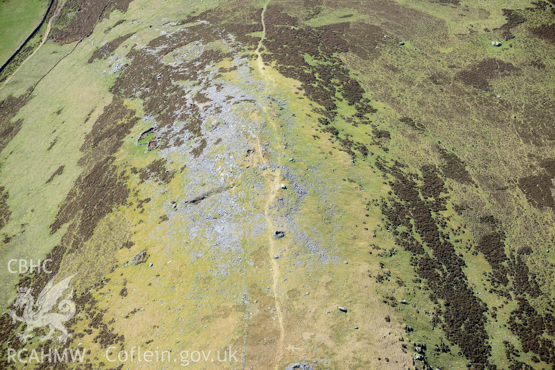 Moel Faban cairn cemetery and settlement, view of south-eastern slopes. Oblique aerial photograph taken during the Royal Commission’s programme of archaeological aerial reconnaissance by Toby Driver on 20 April 2018.