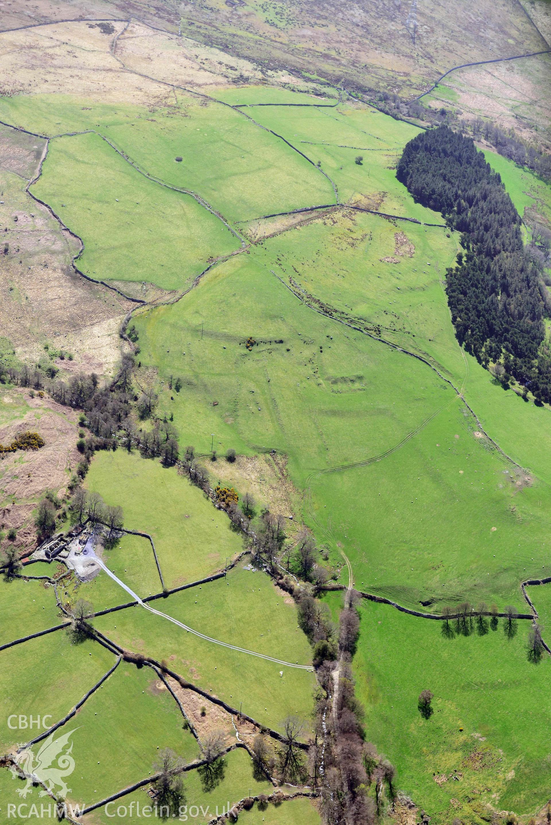 Cae'r Haidd deserted rural settement and field system, view from north. Oblique aerial photograph taken during the Royal Commission’s programme of archaeological aerial reconnaissance by Toby Driver on 20 April 2018.