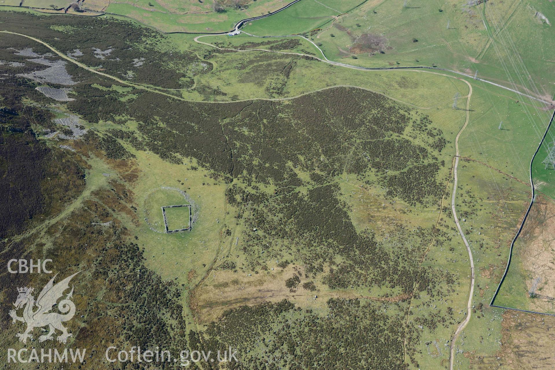 Foel Dduarth enclosure. Oblique aerial photograph taken during the Royal Commission’s programme of archaeological aerial reconnaissance by Toby Driver on 20 April 2018.