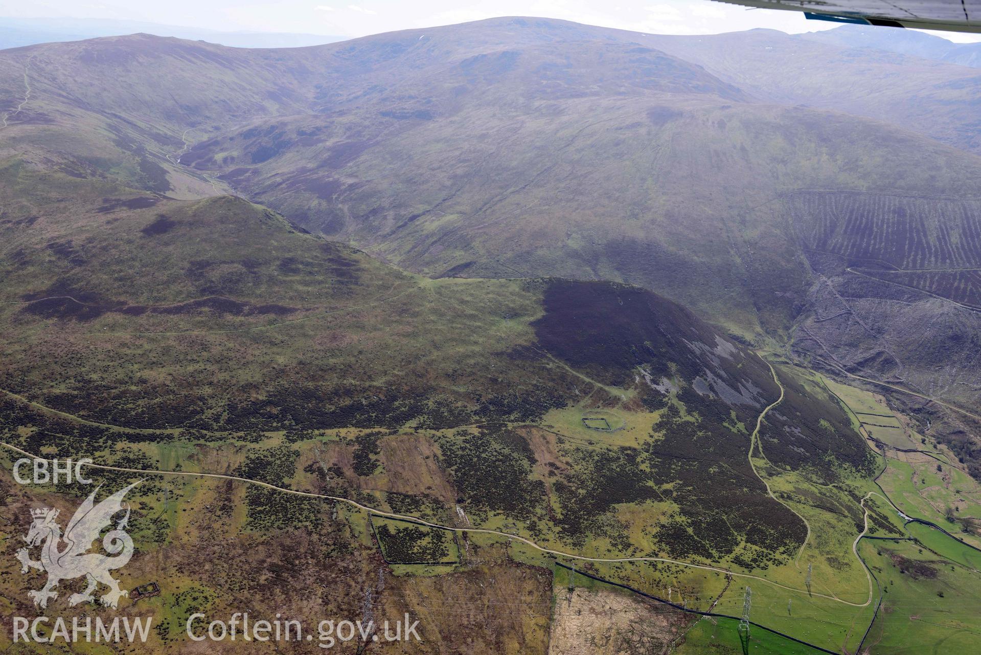 Foel Dduarth and Afon Anafon, landscape view from north. Oblique aerial photograph taken during the Royal Commission’s programme of archaeological aerial reconnaissance by Toby Driver on 20 April 2018.