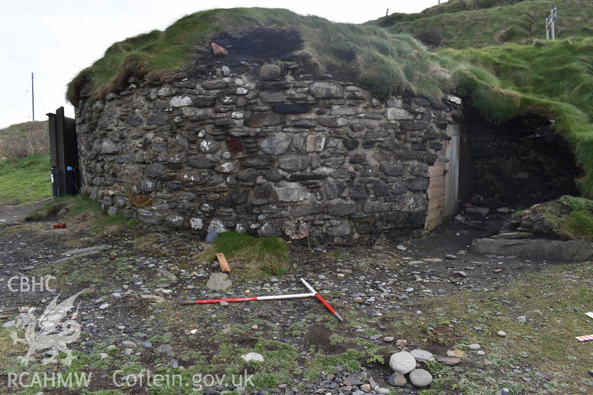 Abereiddy Lime Kiln 1 looking east from the top of the beach on 19/03/2024. Scales are 1m. Produced by Julian Whitewright of the RCAHMW Survey Team.