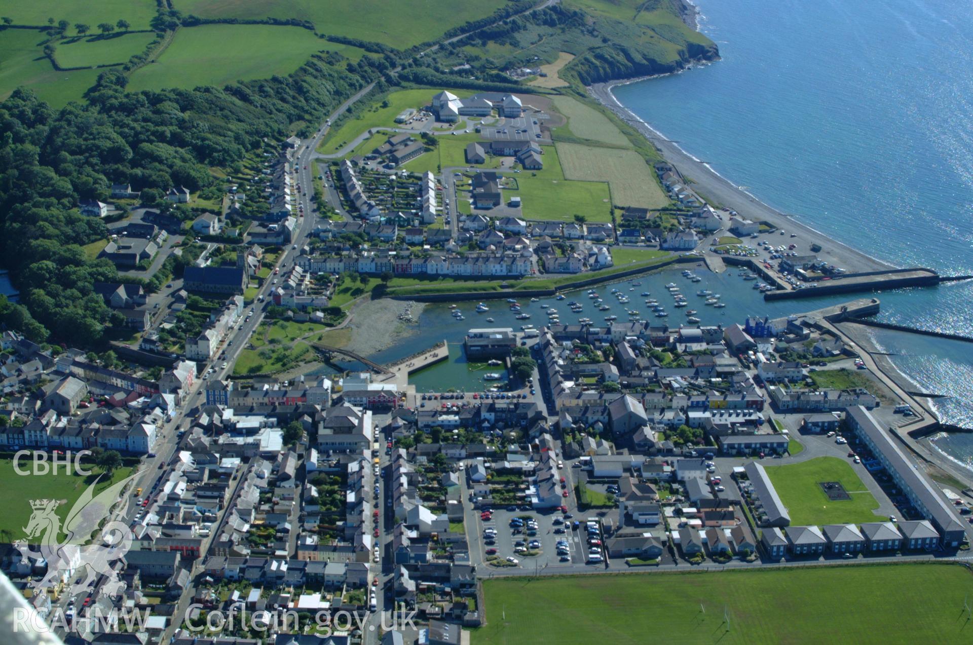 RCAHMW colour oblique aerial photograph of the north-eastern quay in Aberaeron Harbour taken on 14/06/2004 by Toby Driver