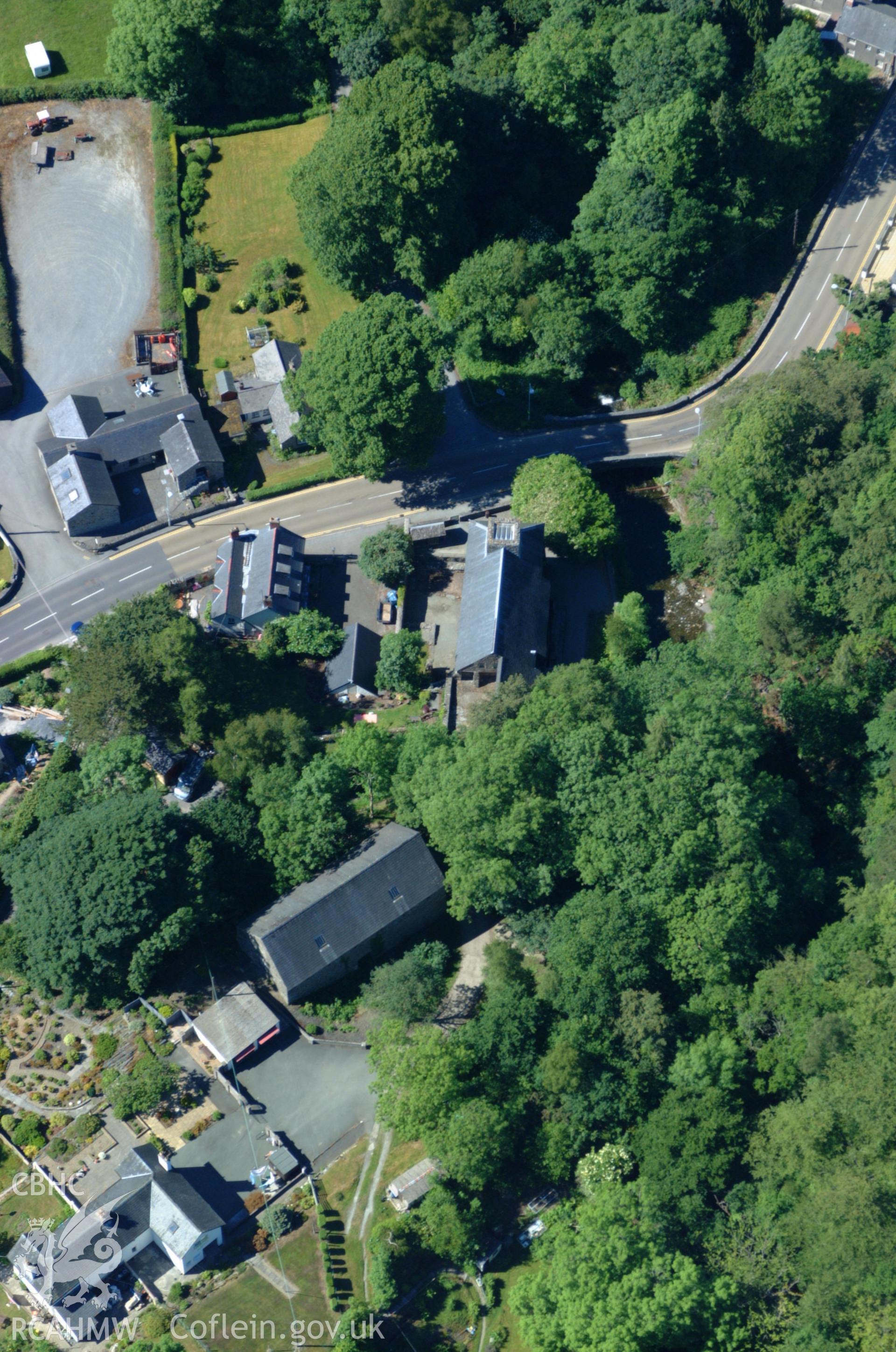 RCAHMW colour oblique aerial photograph of Dyfi blast furnace and charcoal store taken on 14/06/2004 by Toby Driver