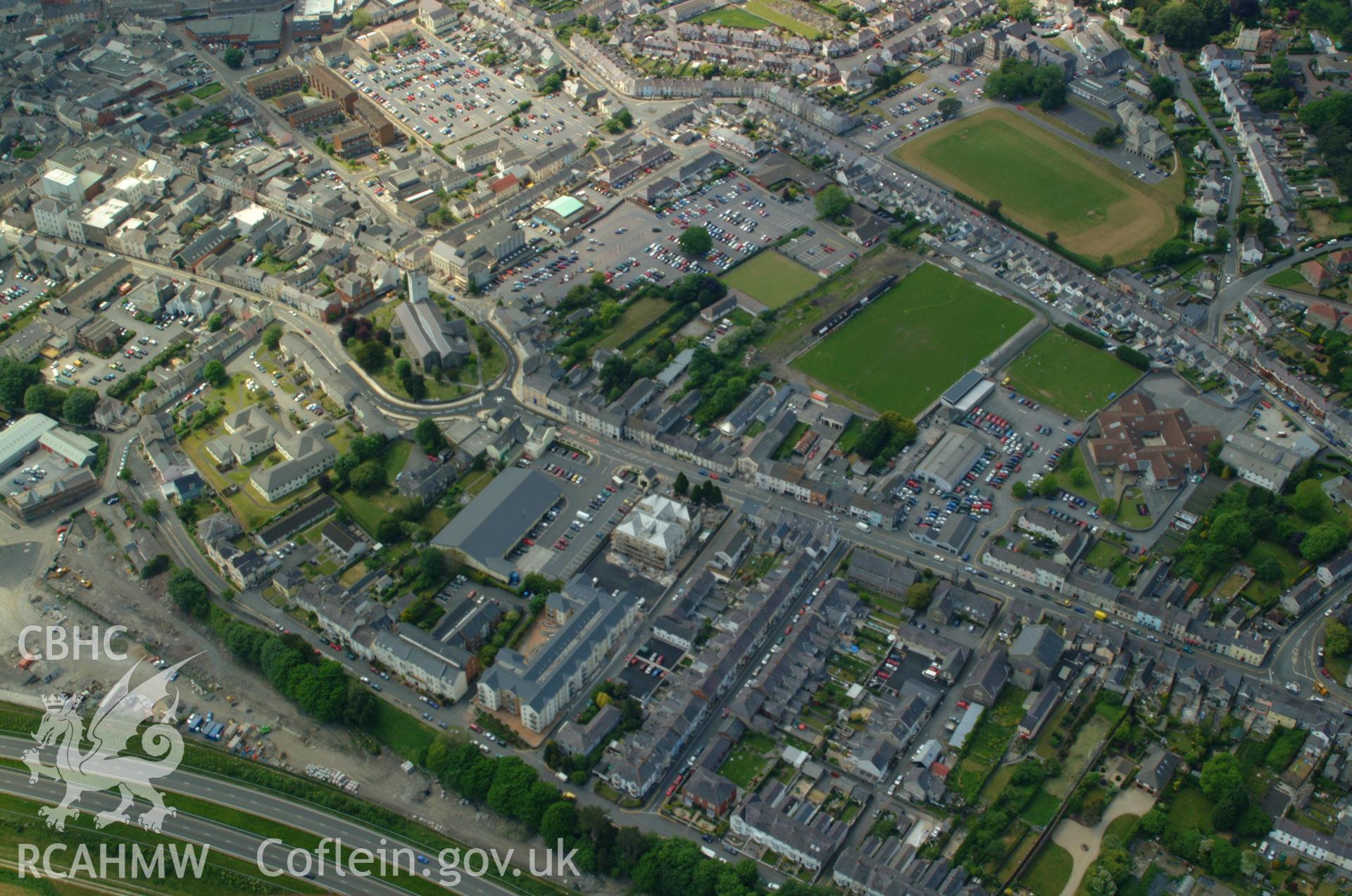 RCAHMW colour oblique aerial photograph of St Peter's Church, Carmarthen taken on 24/05/2004 by Toby Driver