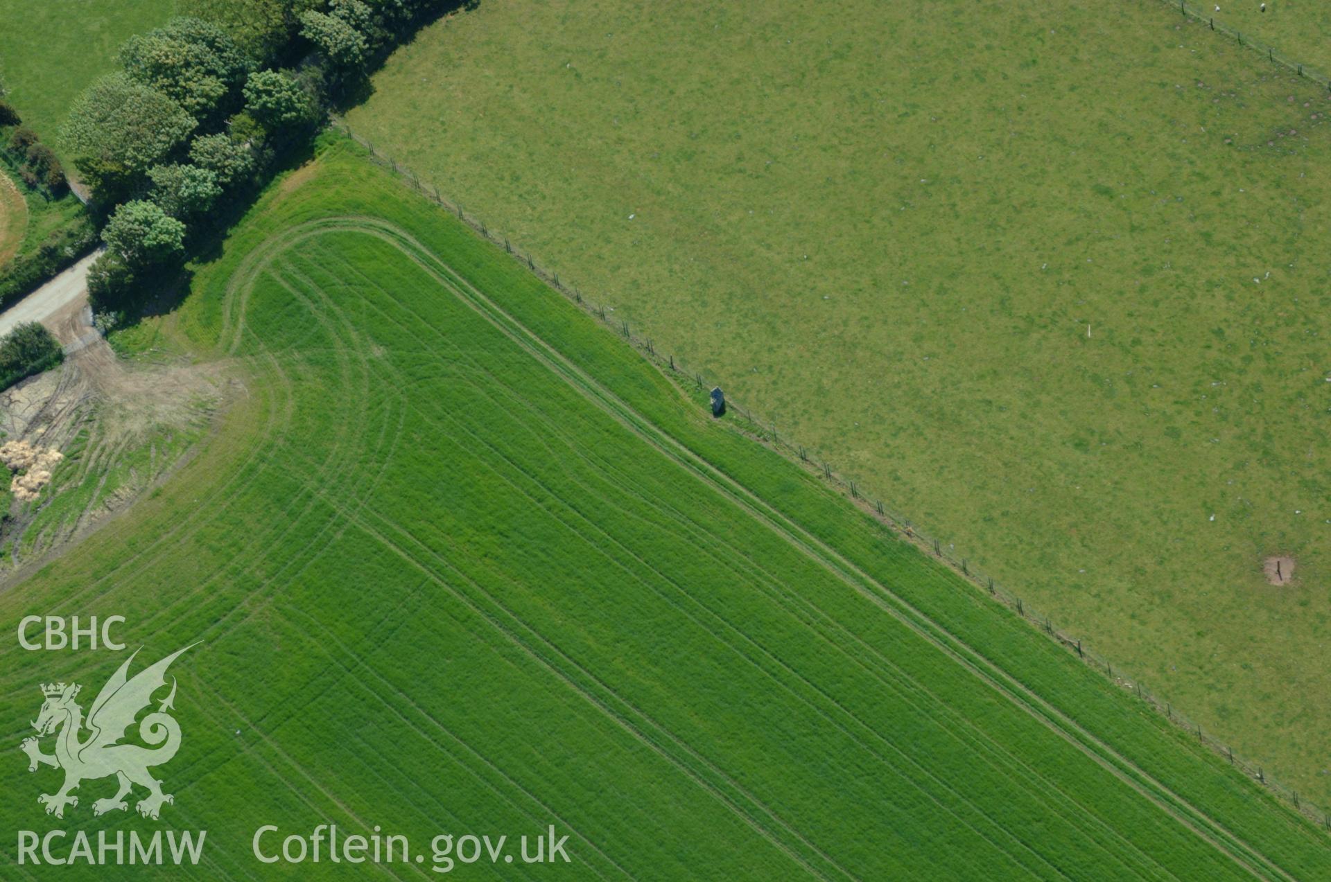 RCAHMW colour oblique aerial photograph of Rhyndaston-fawr Stone taken on 25/05/2004 by Toby Driver