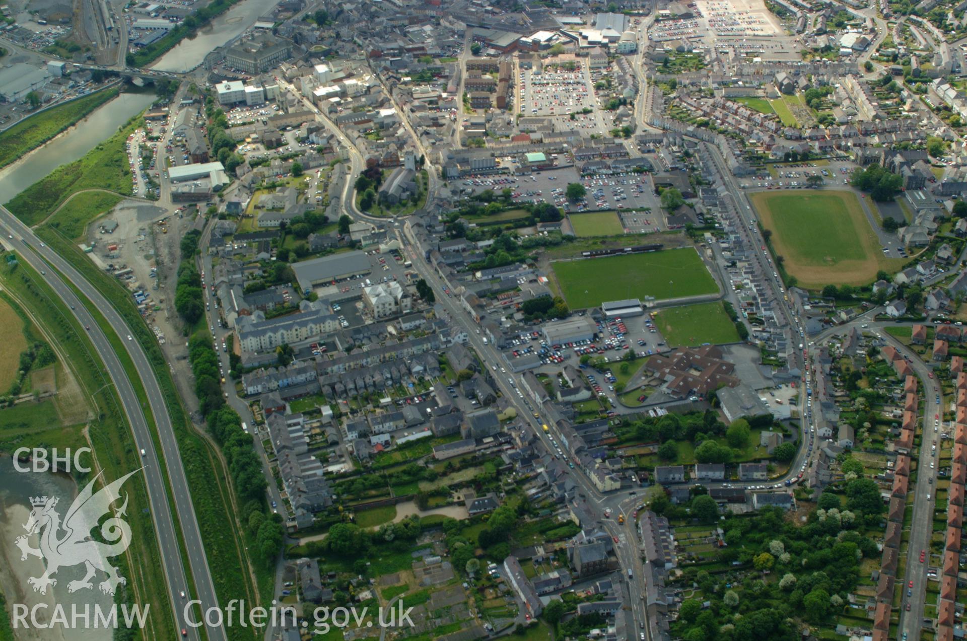 RCAHMW colour oblique aerial photograph of St Peter's Church, Carmarthen taken on 24/05/2004 by Toby Driver