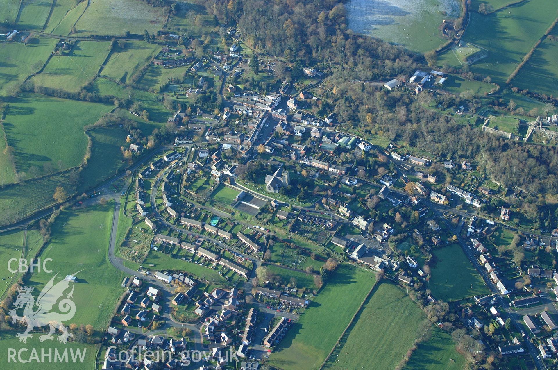 RCAHMW colour oblique aerial photograph of Montgomery Town Walls defences, viewed from the north-east. Taken on 19 November 2004 by Toby Driver