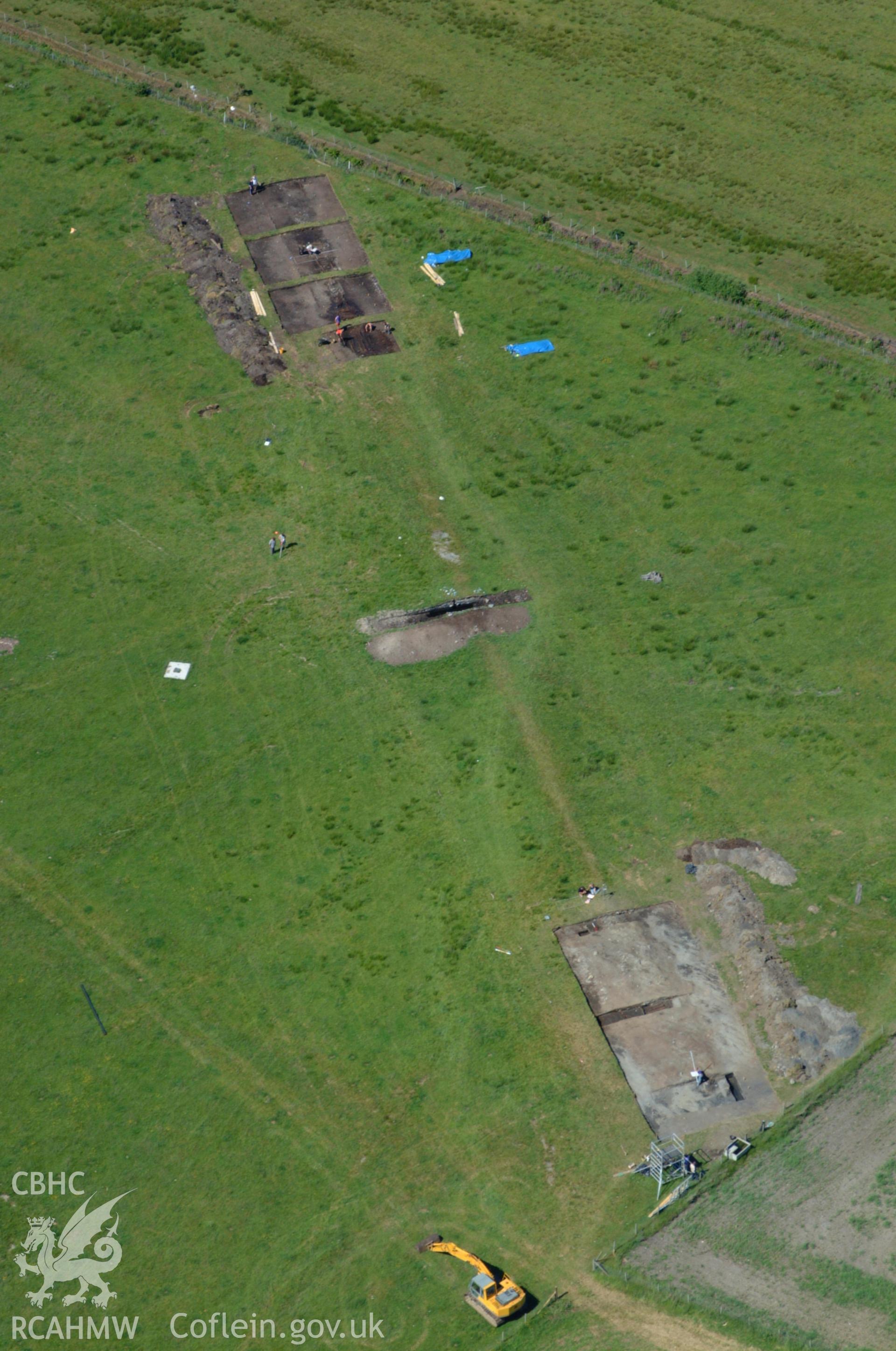 RCAHMW colour oblique aerial photograph of Llangynfelin Timber Trackway taken on 14/06/2004 by Toby Driver