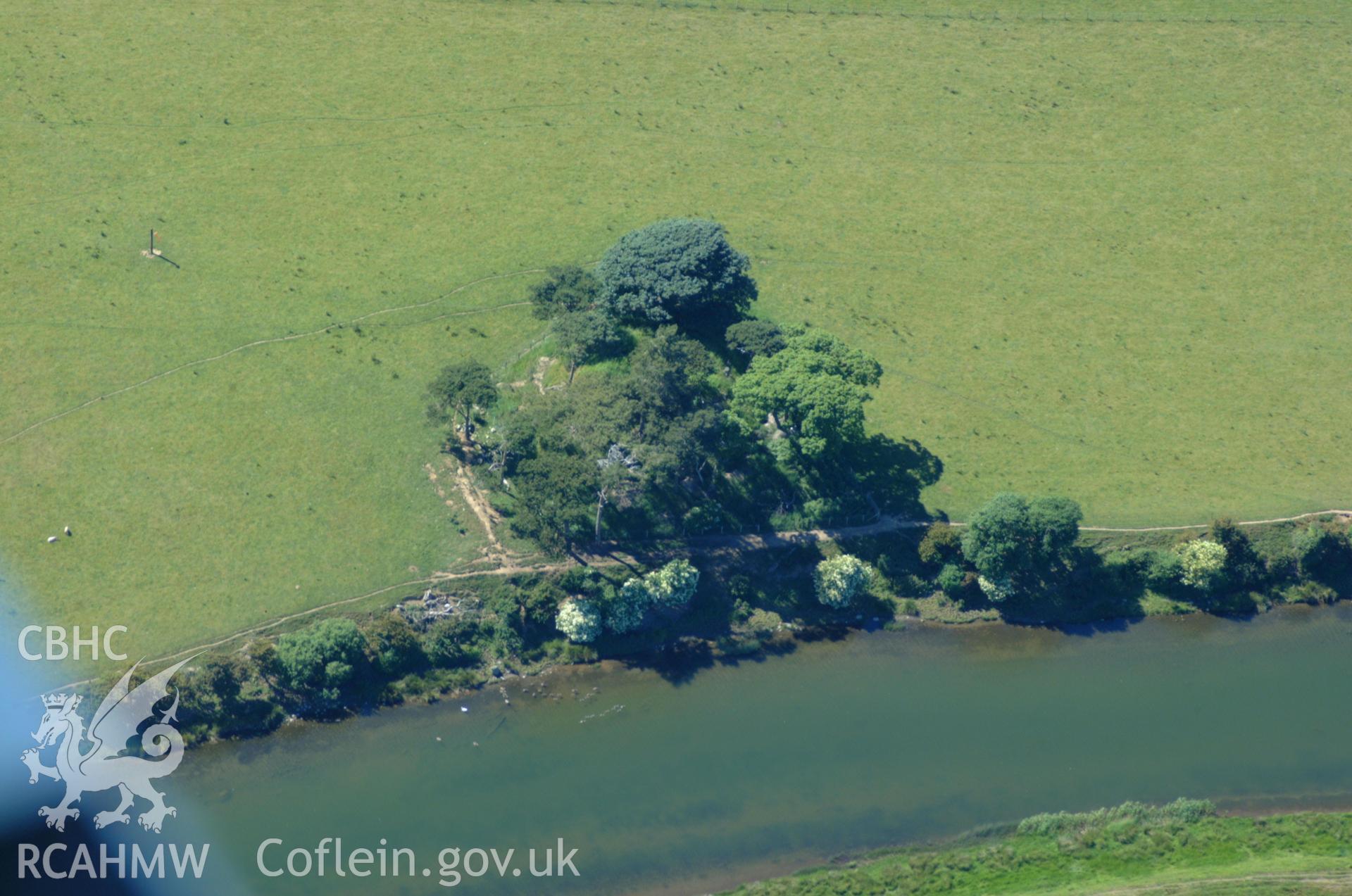 RCAHMW colour oblique aerial photograph of Domen Ddreiniog taken on 14/06/2004 by Toby Driver