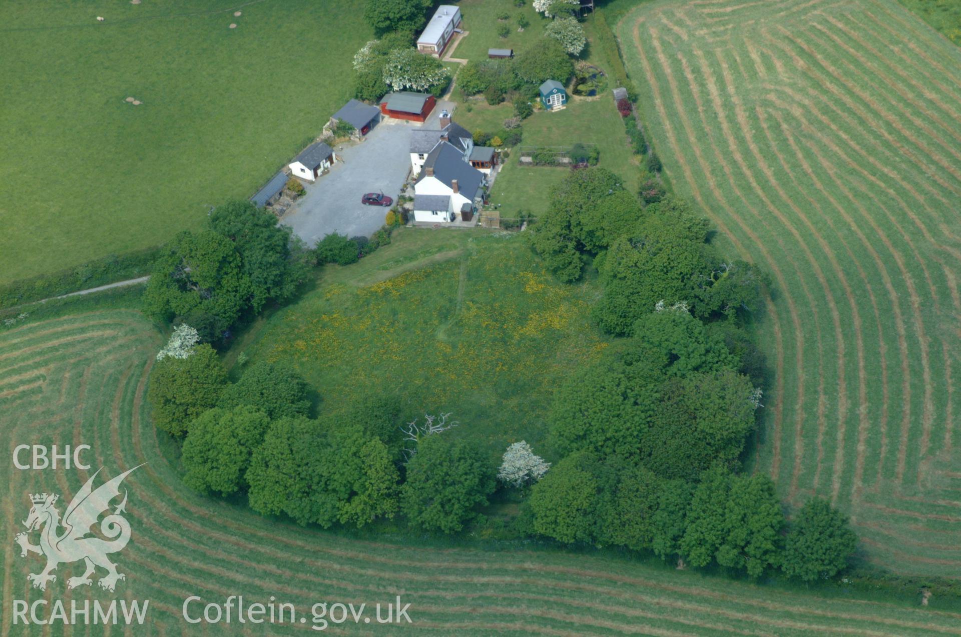 RCAHMW colour oblique aerial photograph of Park Rath Enclosure taken on 24/05/2004 by Toby Driver