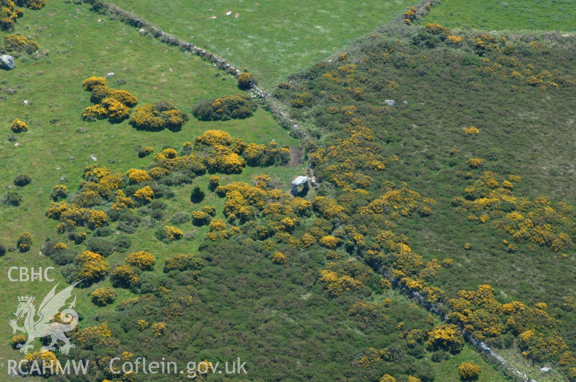 RCAHMW colour oblique aerial photograph of Ffyst Samson Chambered Tomb taken on 25/05/2004 by Toby Driver