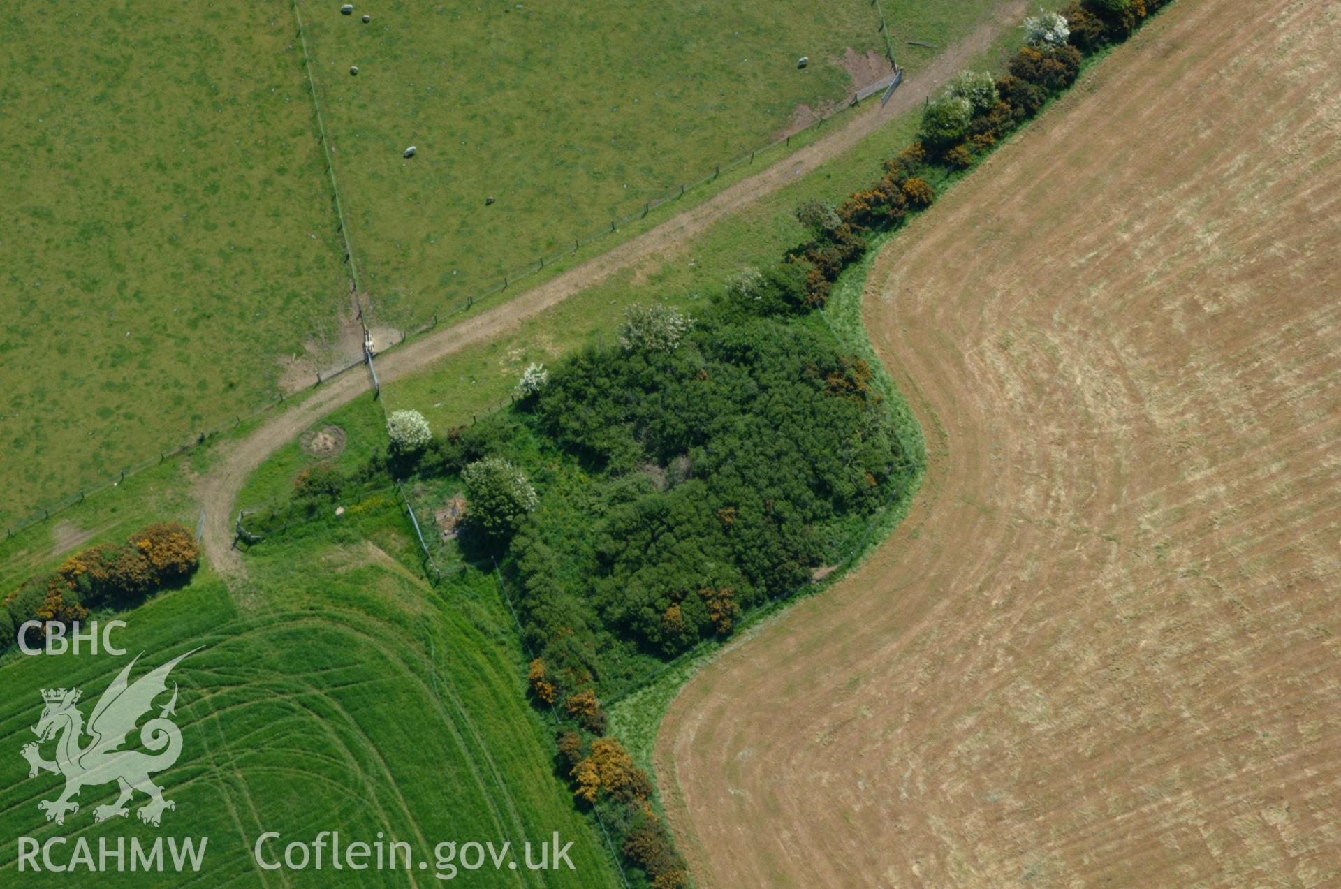 RCAHMW colour oblique aerial photograph of Rhynaston-fawr Tump taken on 25/05/2004 by Toby Driver