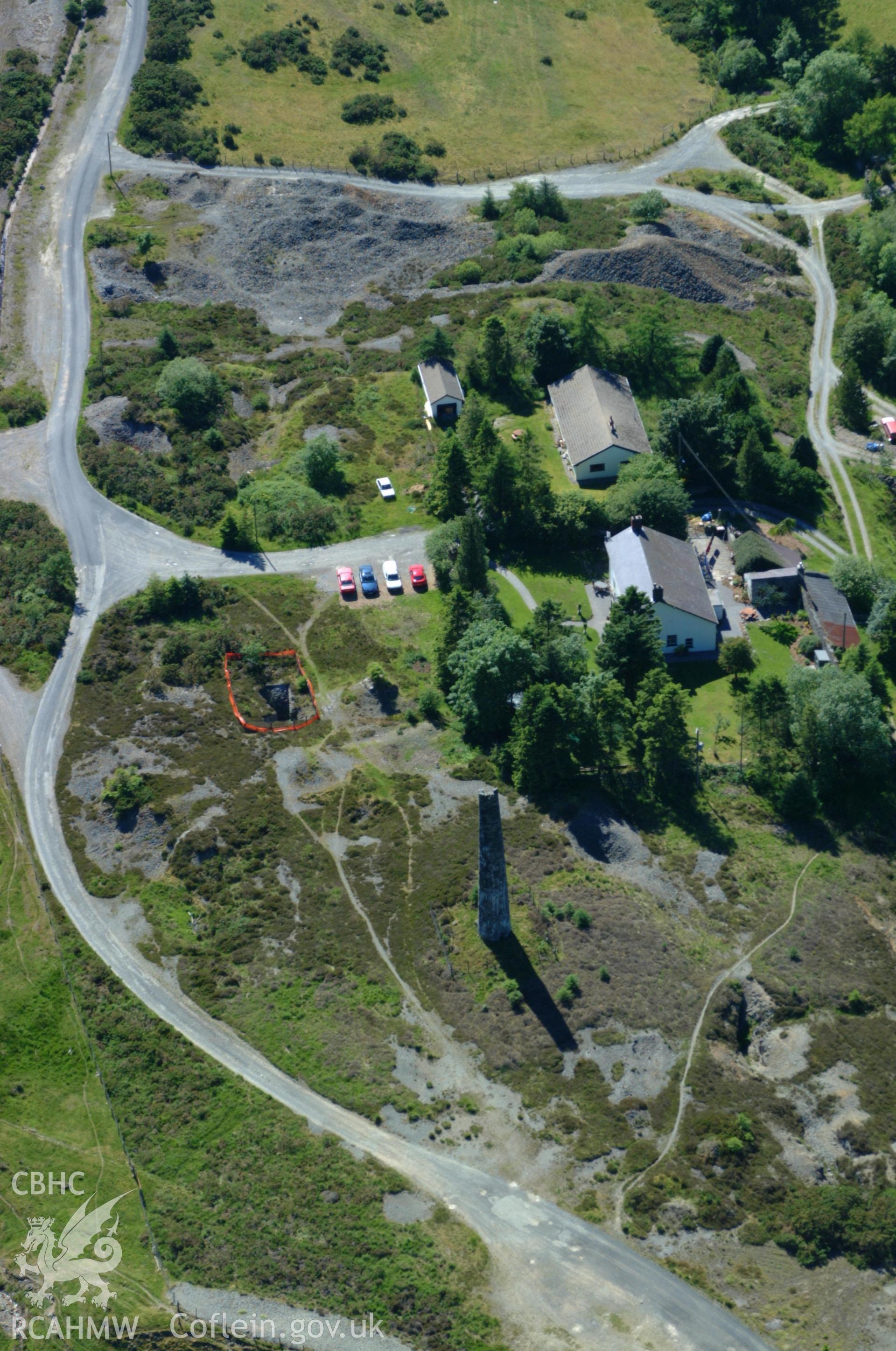 RCAHMW colour oblique aerial photograph of Pryse's shaft at Cwmsymlog Mine taken on 14/06/2004 by Toby Driver