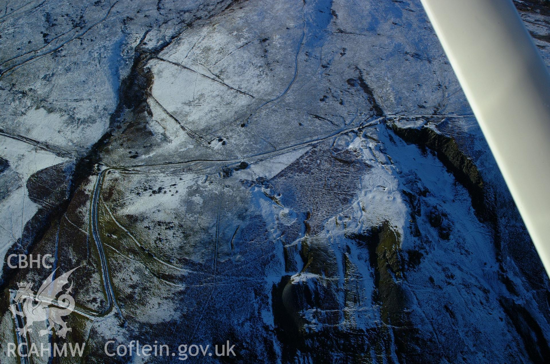 RCAHMW colour oblique aerial photograph of Craig-y-Mwyn Lead Mine, Llanrhaeadr-Ym-Mochnant, from the east. Taken on 19 November 2004 by Toby Driver