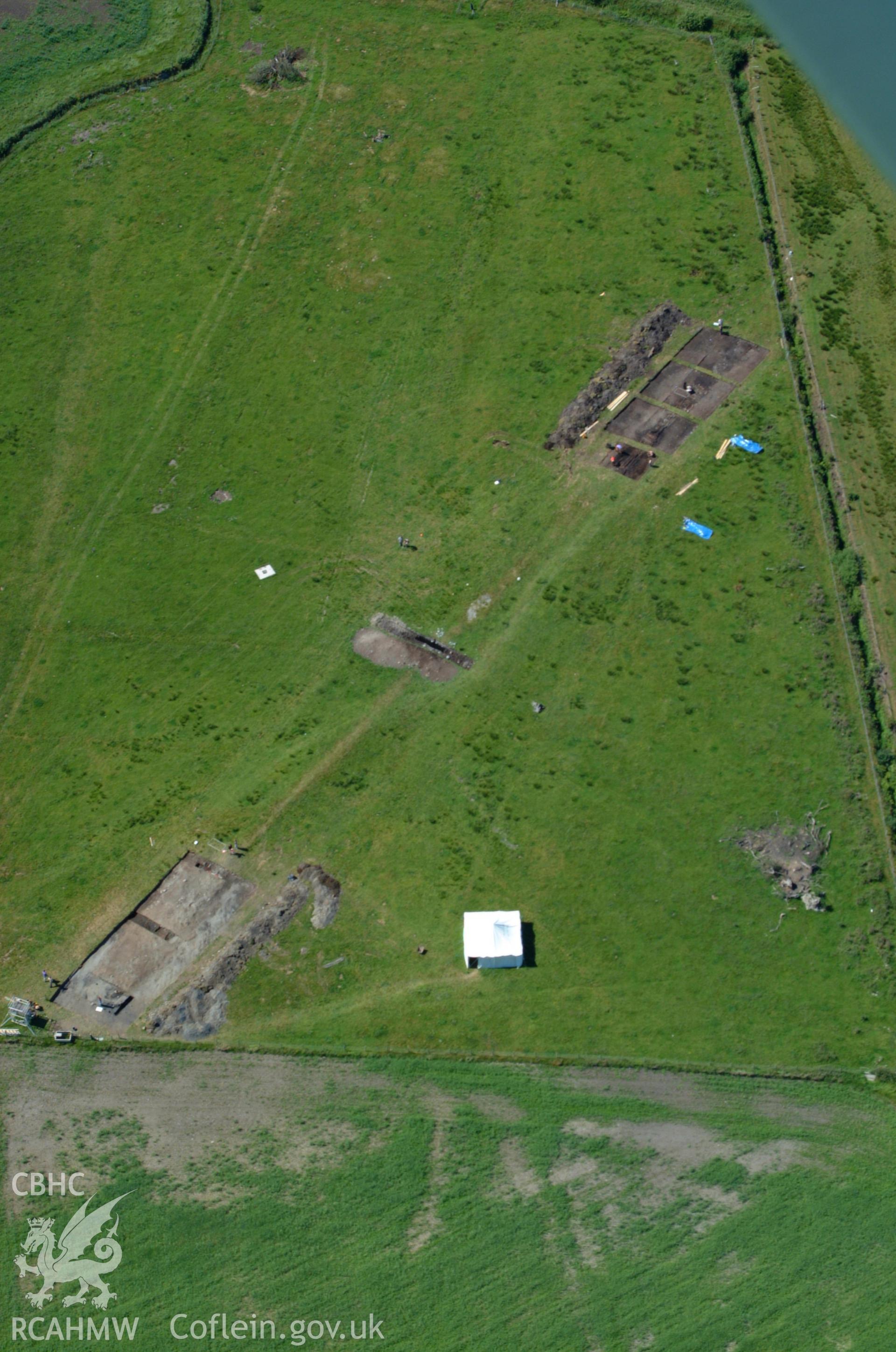 RCAHMW colour oblique aerial photograph of Llangynfelin Timber Trackway taken on 14/06/2004 by Toby Driver