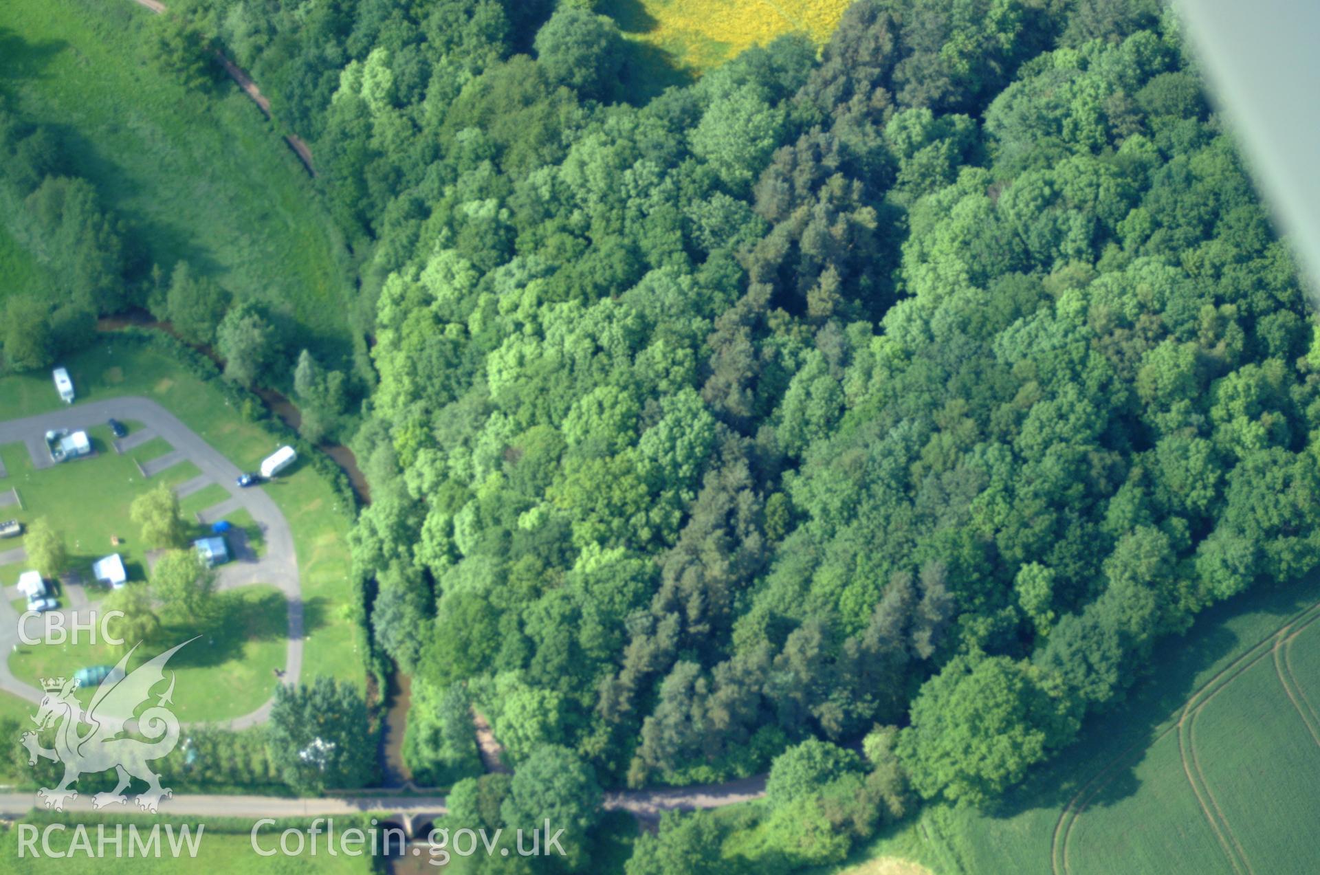 RCAHMW colour oblique aerial photograph of Mill Wood Castle, opposite Dingestow taken on 02/06/2004 by Toby Driver