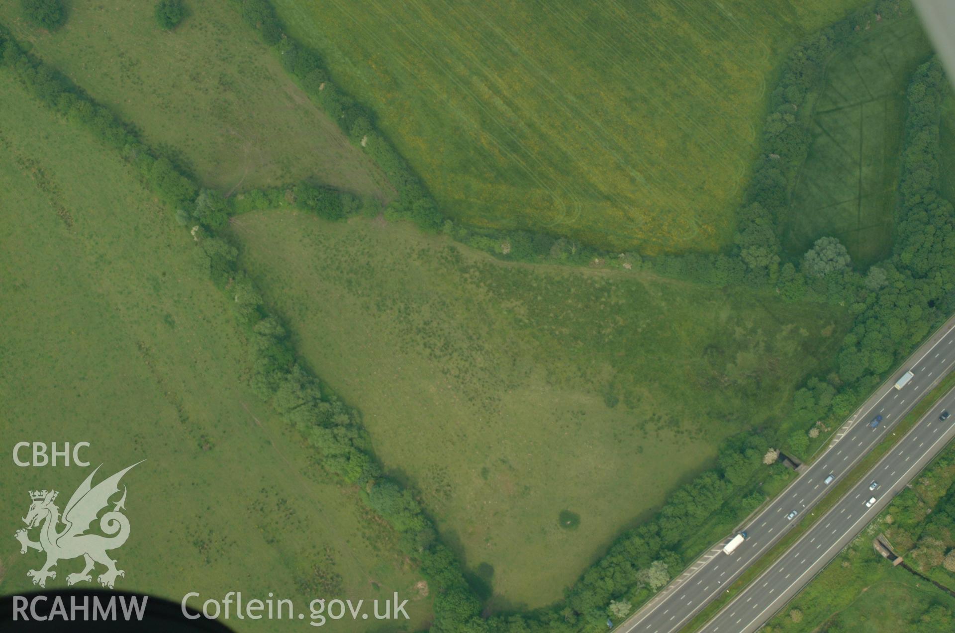RCAHMW colour oblique aerial photograph of Ford Farm Roman Villa taken on 26/05/2004 by Toby Driver