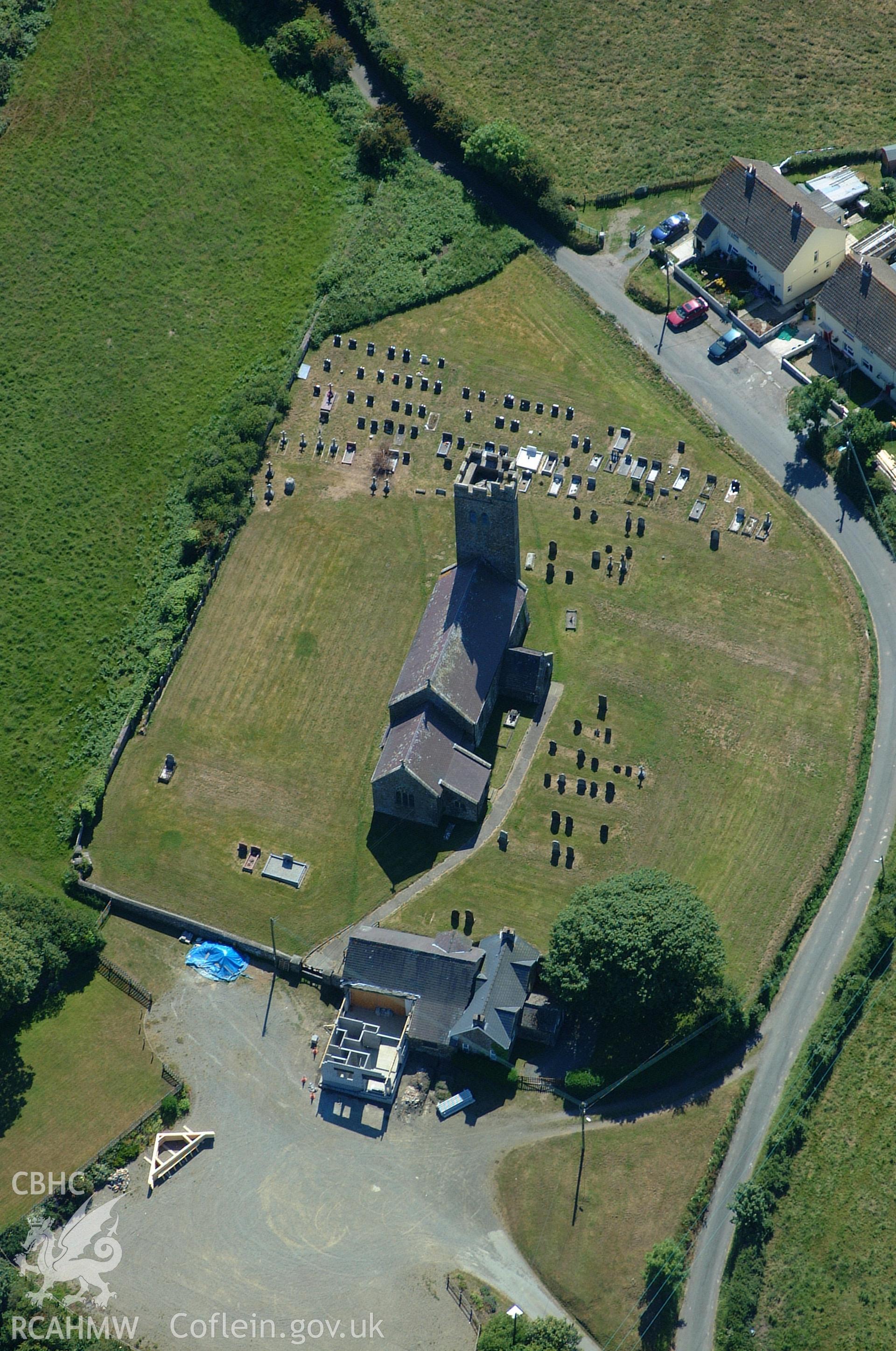 RCAHMW colour oblique aerial photograph of St James' Church, Walwyns Castle. Taken on 15 June 2004 by Toby Driver