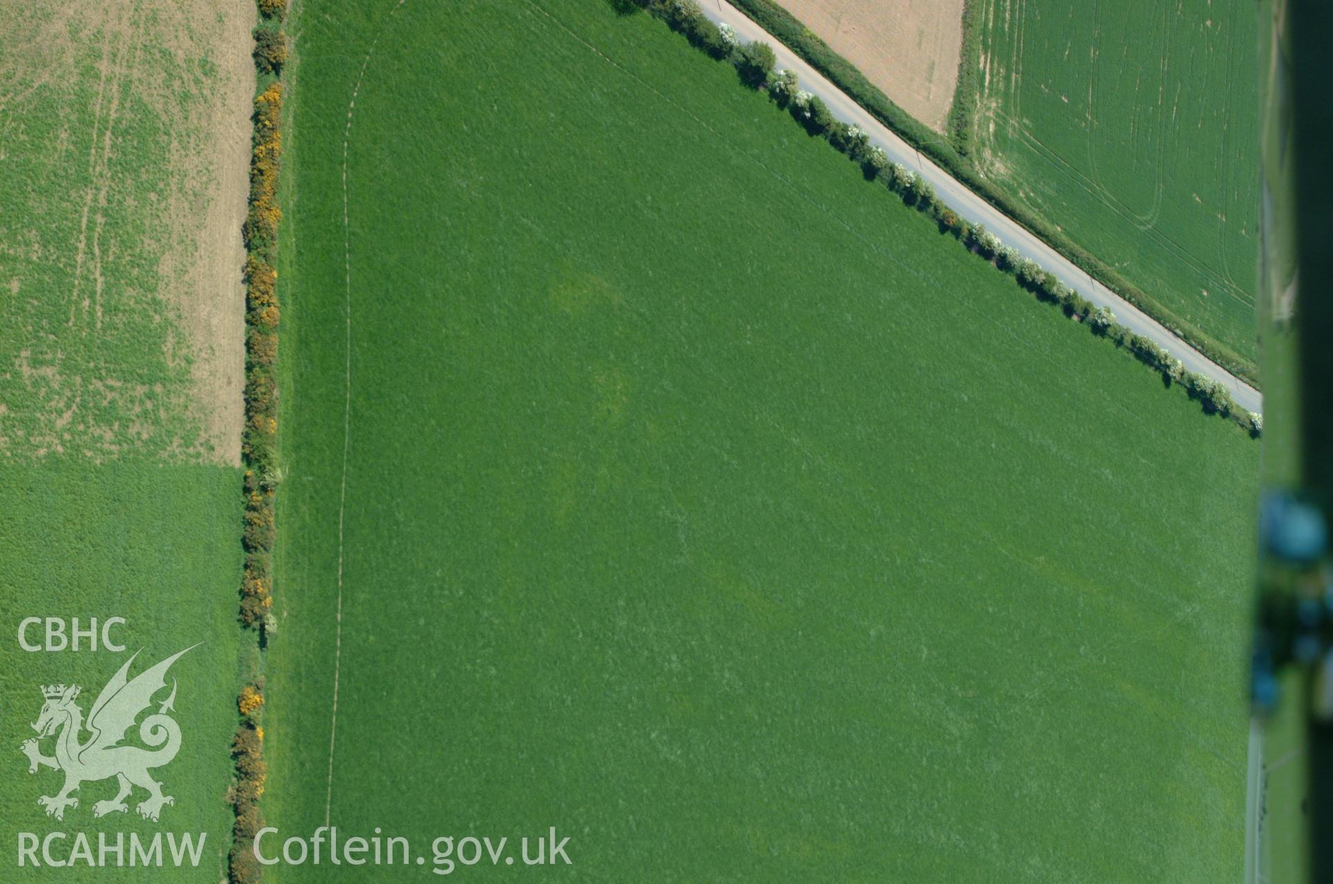 RCAHMW colour oblique aerial photograph of Castles at Jordanston Hill. Taken on 25 May 2004 by Toby Driver