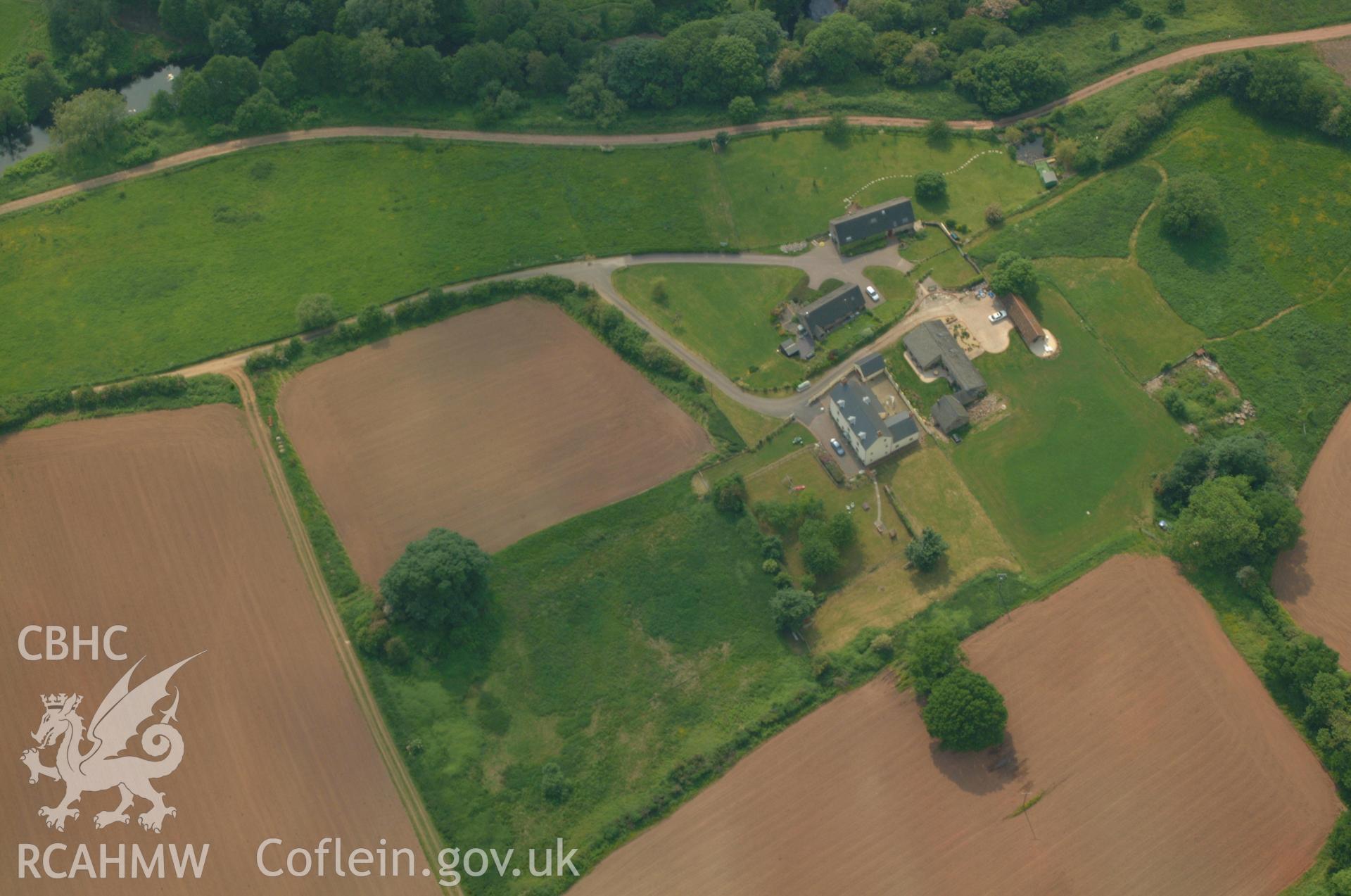 RCAHMW colour oblique aerial photograph of Penrhos Camp Civil War Earthworks taken on 26/05/2004 by Toby Driver