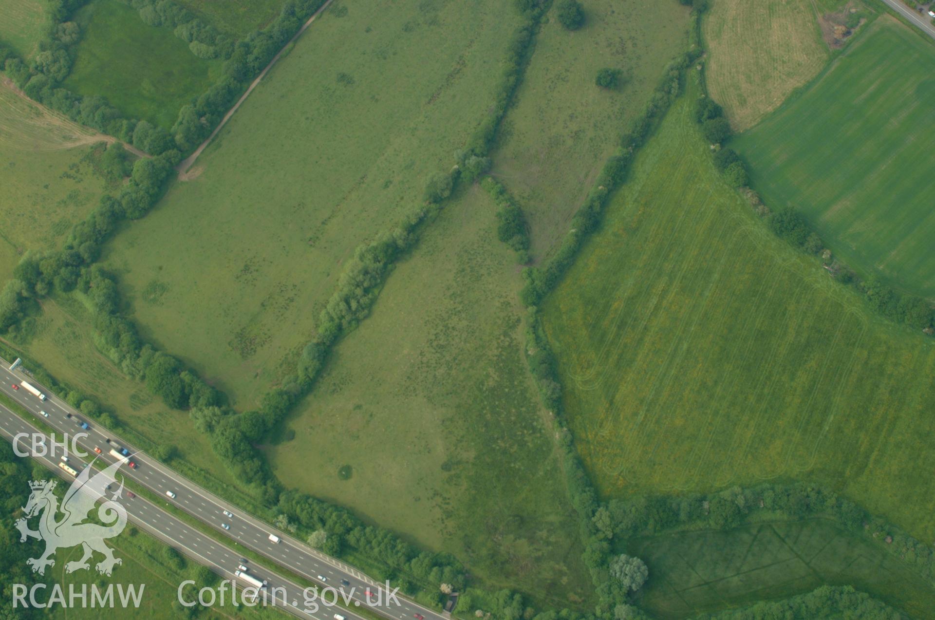 RCAHMW colour oblique aerial photograph of Ford Farm Roman Villa taken on 26/05/2004 by Toby Driver