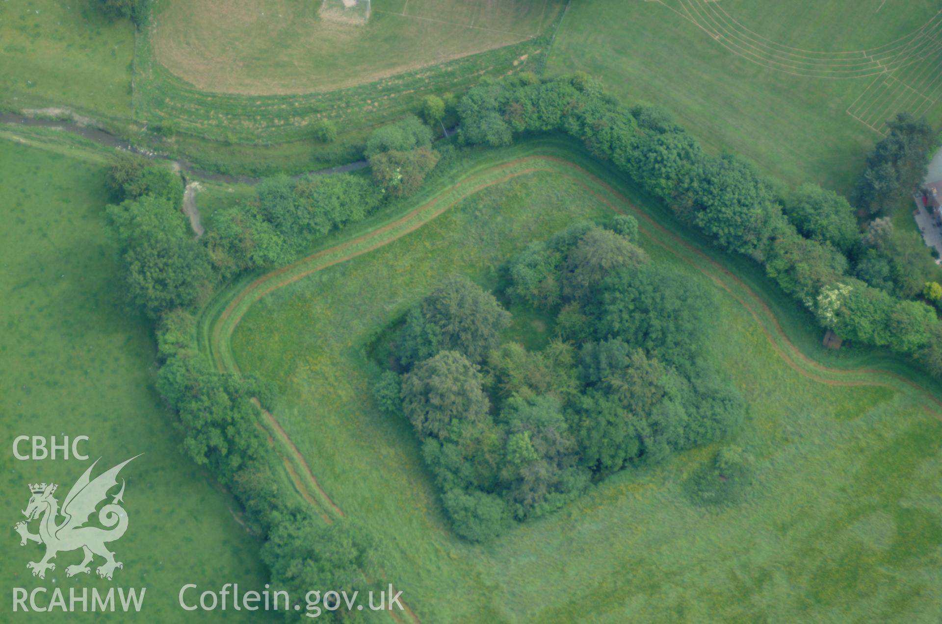 RCAHMW colour oblique aerial photograph of the moat at Cwrt-y-person taken on 08/06/2004 by Toby Driver