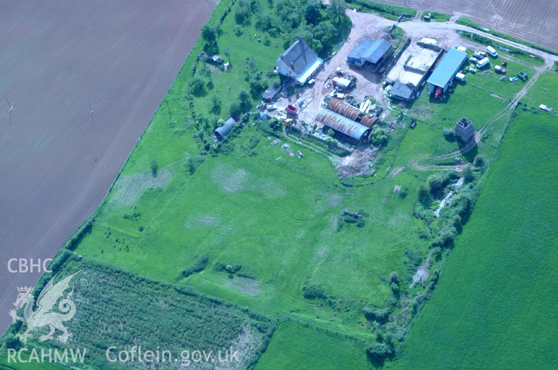 RCAHMW colour oblique aerial photograph of Perth-hir ruins taken on 02/06/2004 by Toby Driver