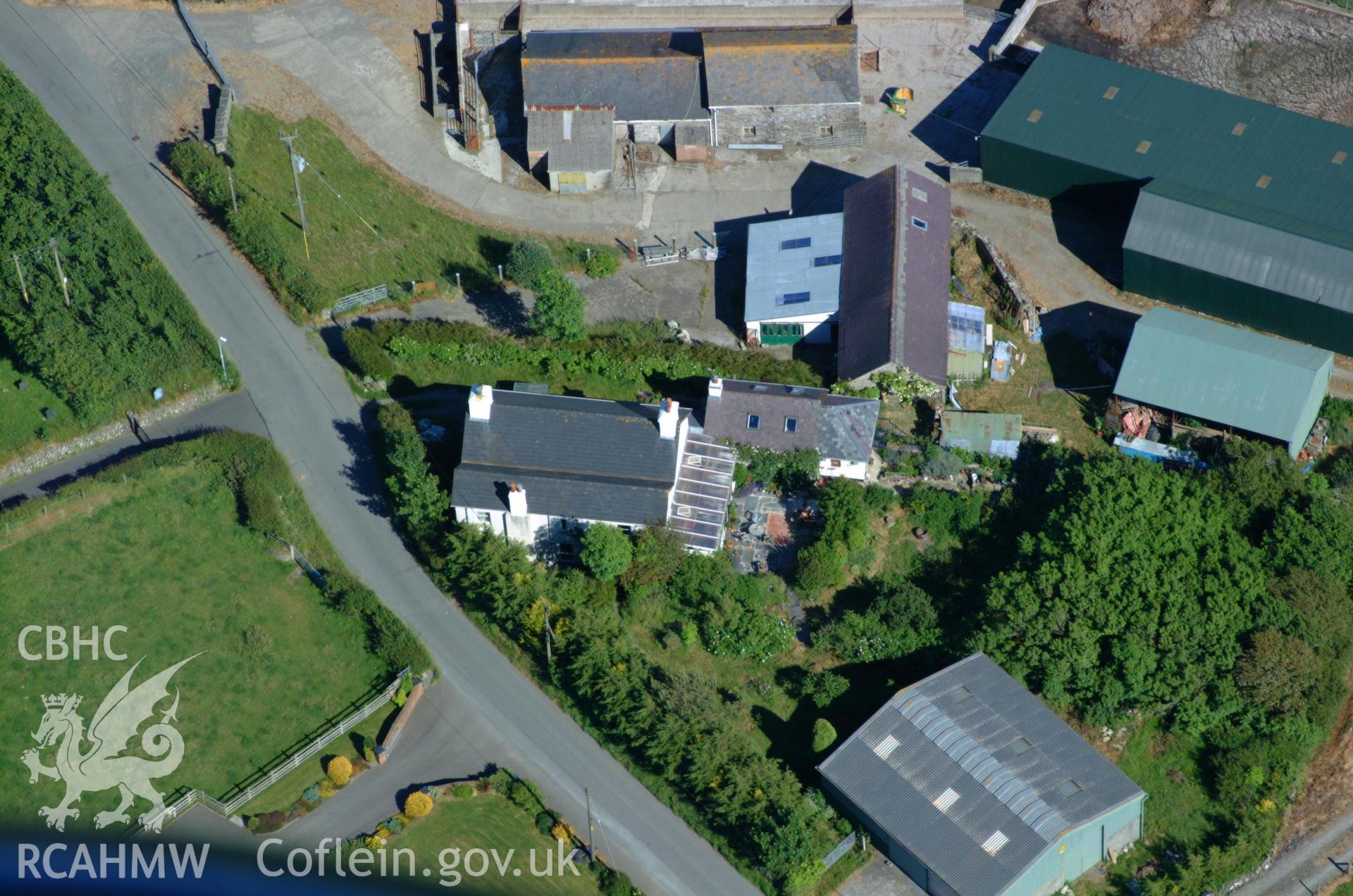 RCAHMW colour oblique aerial photograph of Llanddeiniol Village, Llwyn Deiniol. Taken on 14 June 2004 by Toby Driver