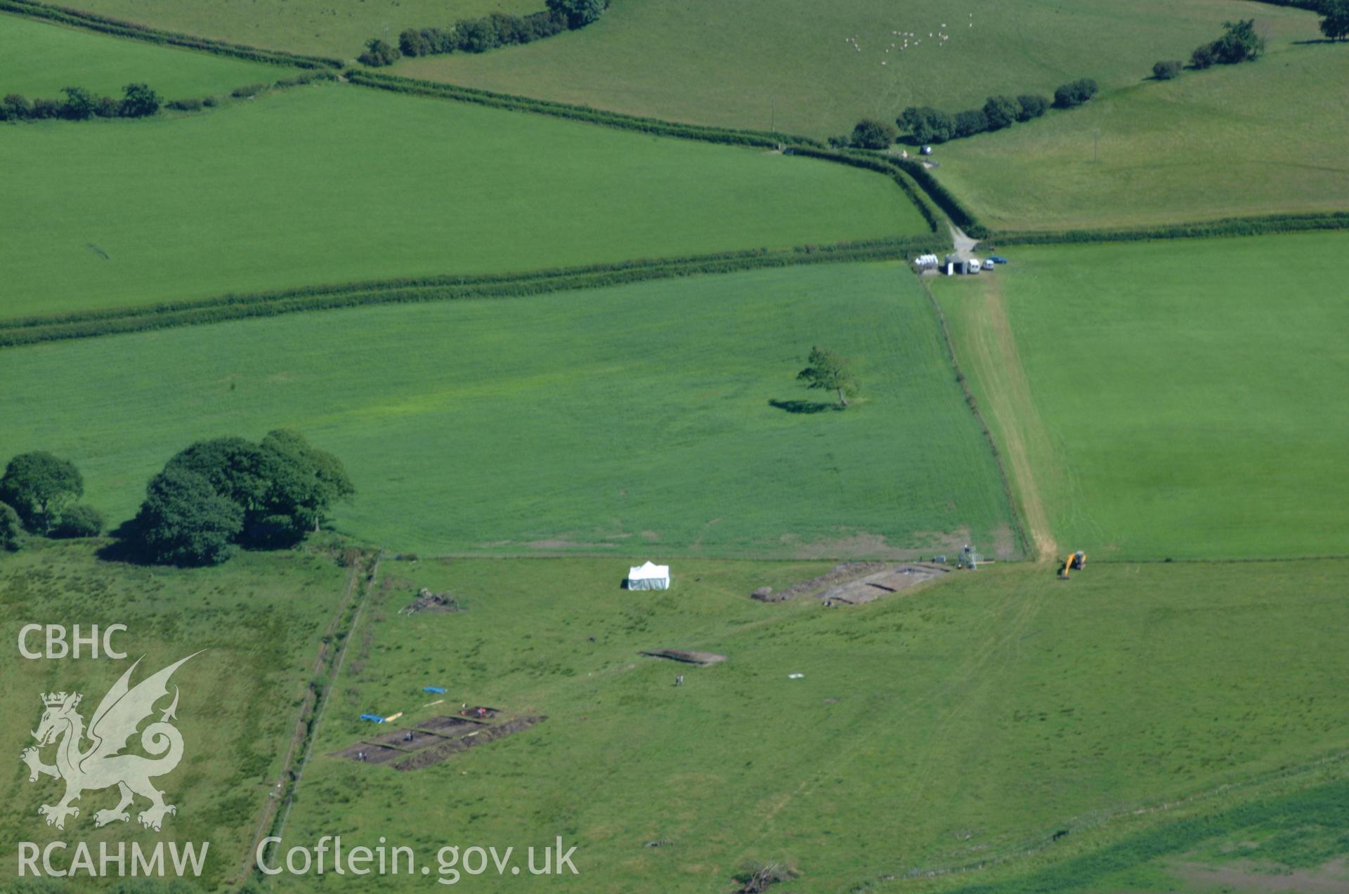 RCAHMW colour oblique aerial photograph of Llangynfelin Timber Trackway taken on 14/06/2004 by Toby Driver