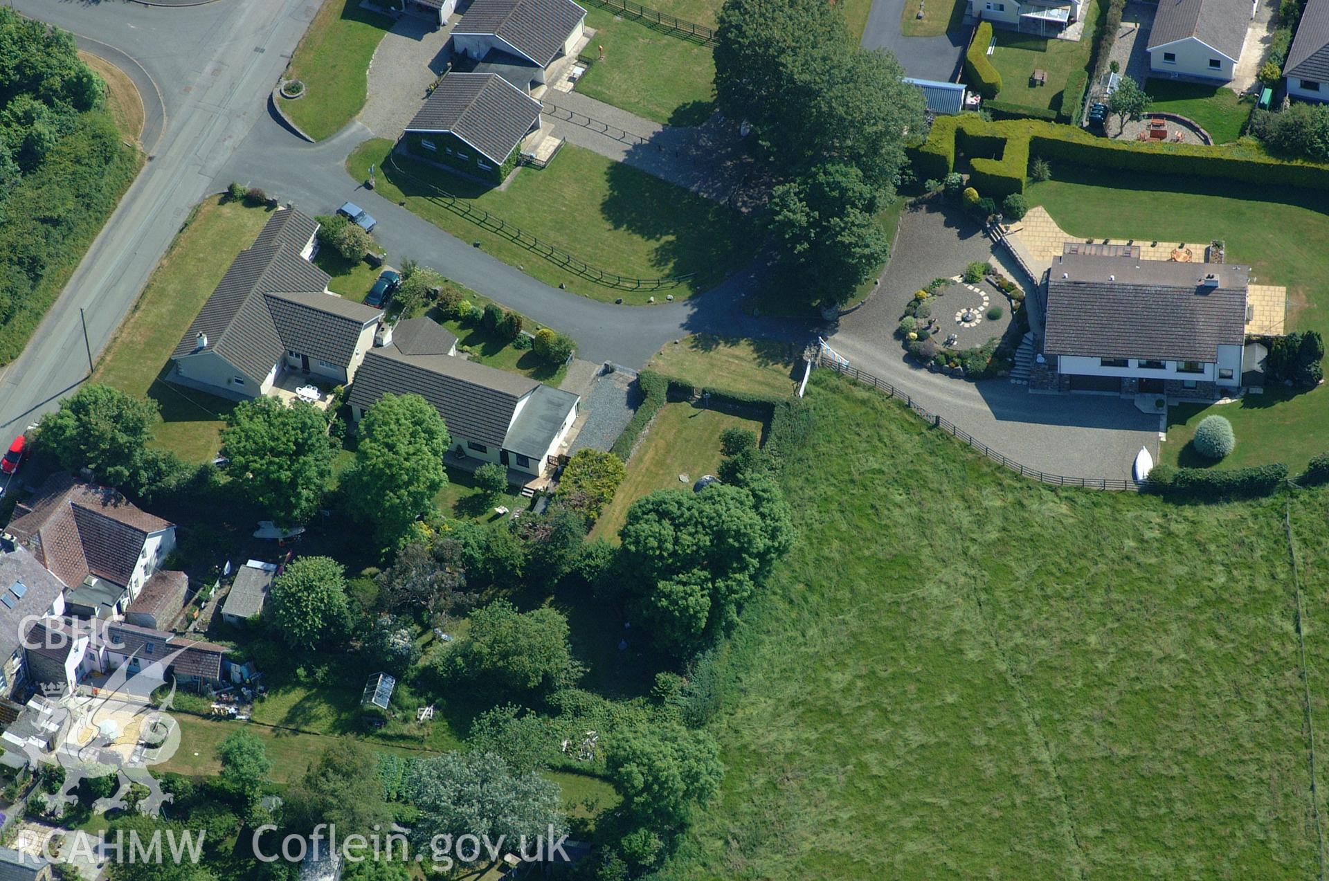 RCAHMW colour oblique aerial photograph of Carreg Coetan Arthur. Taken on 15 June 2004 by Toby Driver