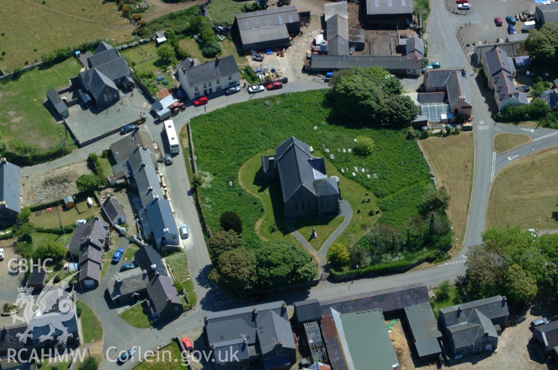 RCAHMW colour oblique aerial photograph of Church of the Holy Martyrs, Mathry taken on 25/05/2004 by Toby Driver