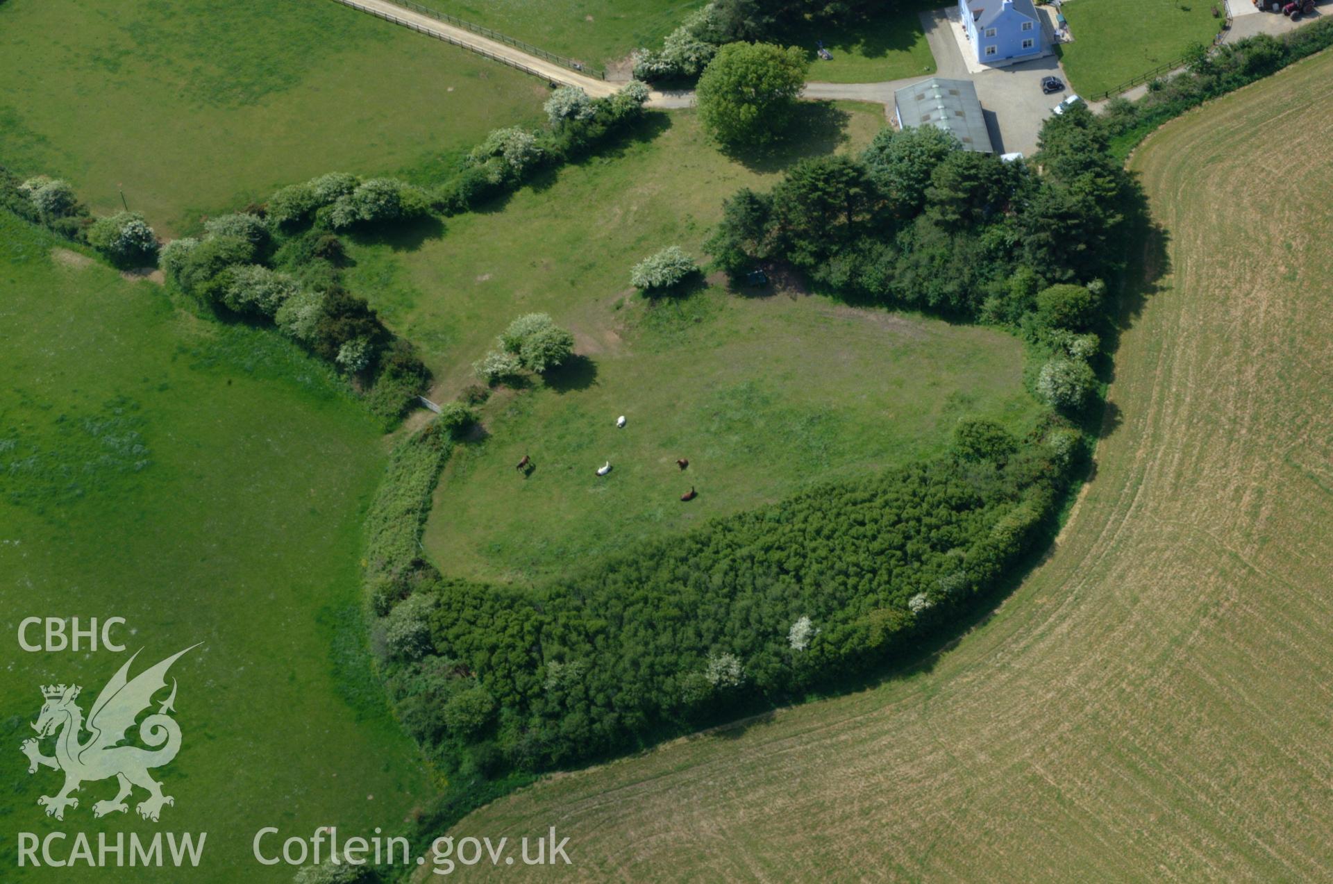 RCAHMW colour oblique aerial photograph of Plumstone Rath taken on 25/05/2004 by Toby Driver