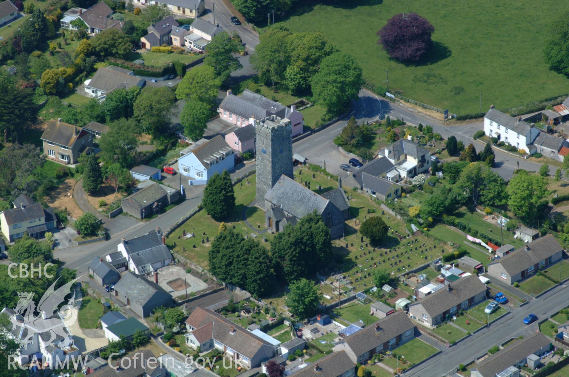 RCAHMW colour oblique aerial photograph of St Tyfai's Church, Lamphey taken on 24/05/2004 by Toby Driver