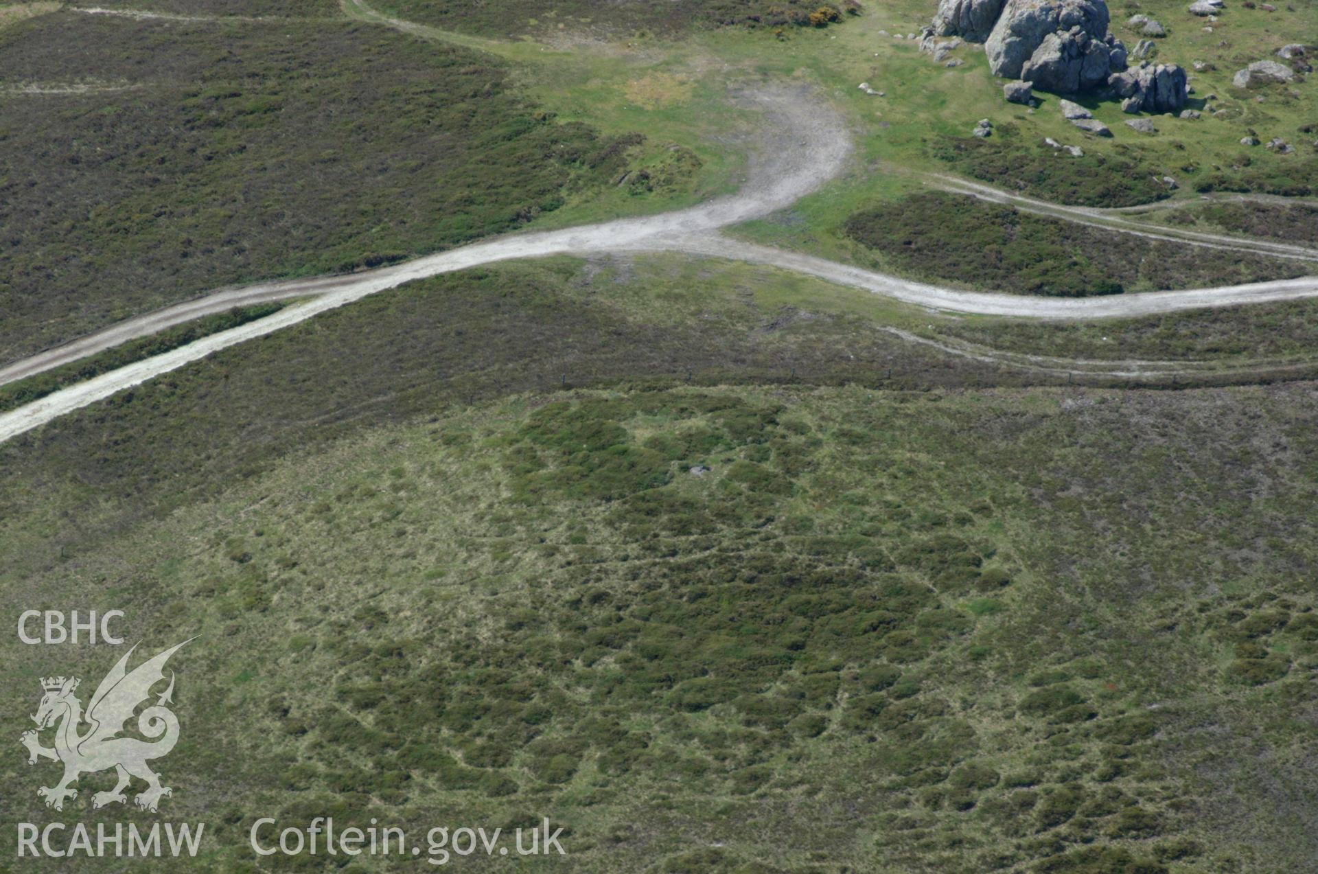 RCAHMW colour oblique aerial photograph of Plumstone Mountain Centre I Barrow from the north. Taken on 25 May 2004 by Toby Driver