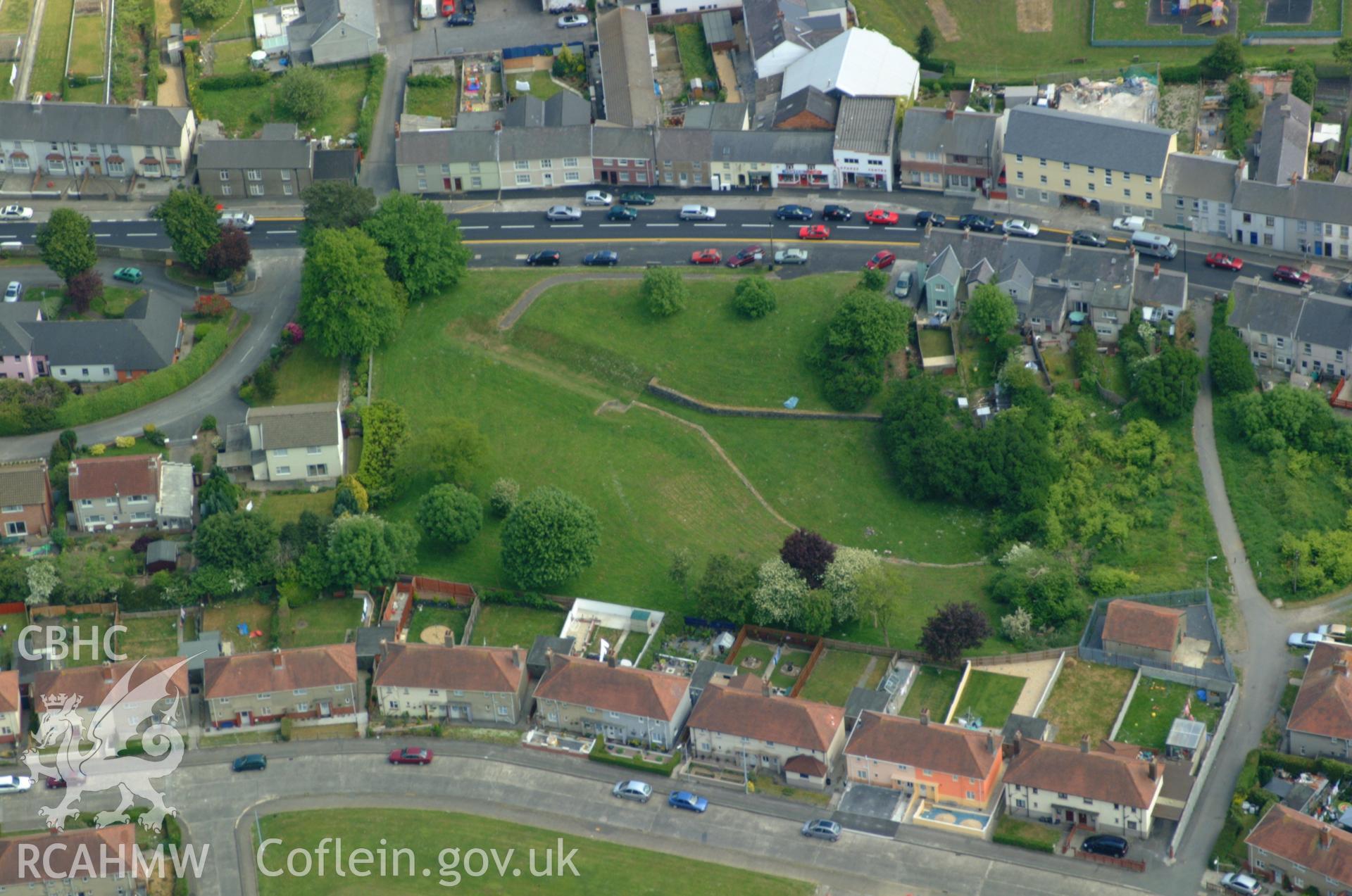 RCAHMW colour oblique aerial photograph of Carmarthen Roman Amphitheatre taken on 24/05/2004 by Toby Driver