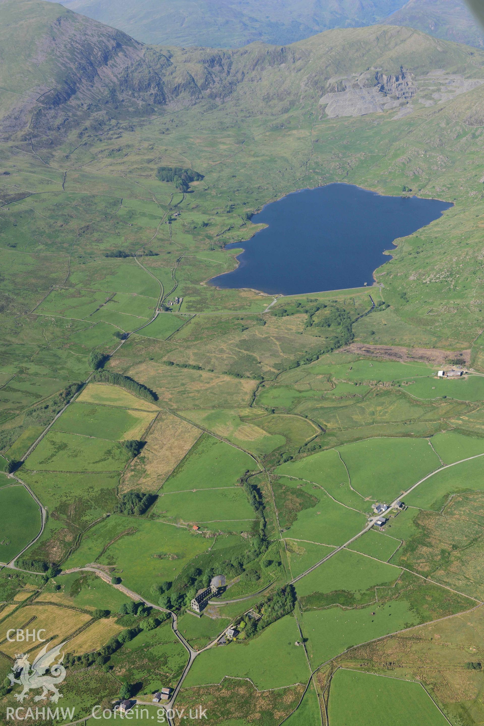 Ynysypandy slate slab mill, with view northeast to Gorseddau slate quarry. Oblique aerial photograph taken during the Royal Commission