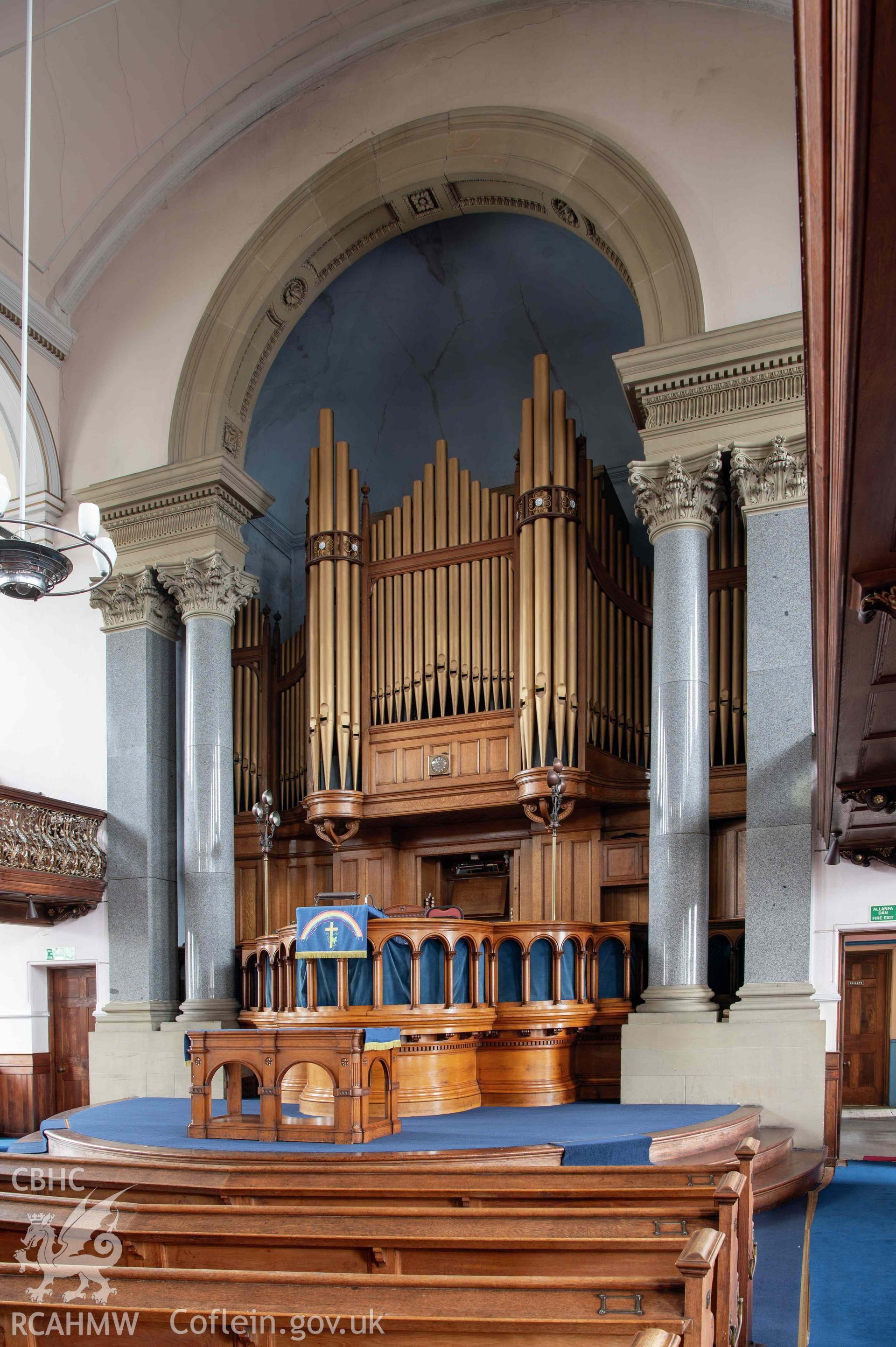 Capel Zion Baptist Chapel, Newtown - auditorium, view to pulpit with communion table in front, organ and organ bay.