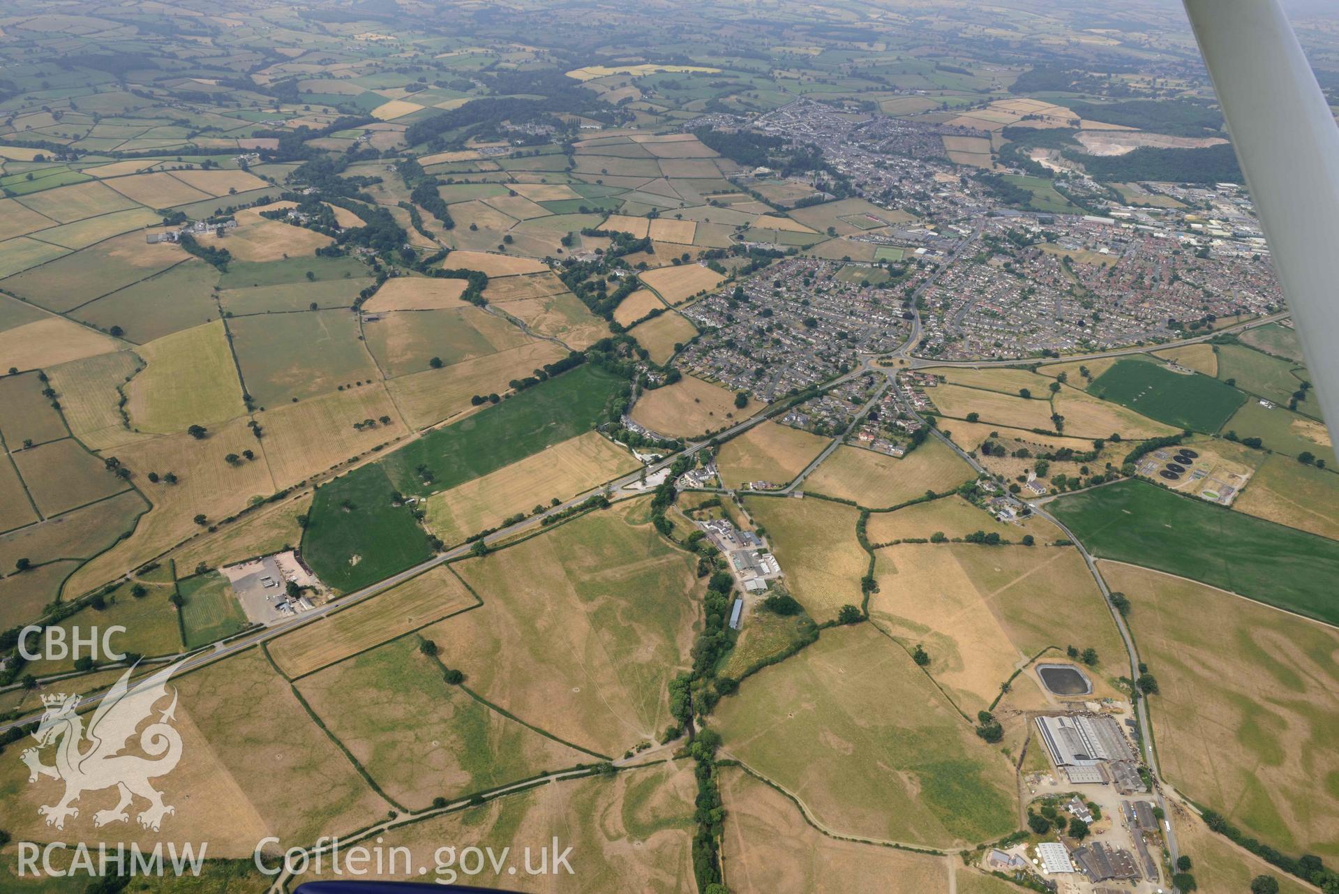 Denbigh Town with cropmarks from the south east. Oblique aerial photograph taken during the Royal Commission