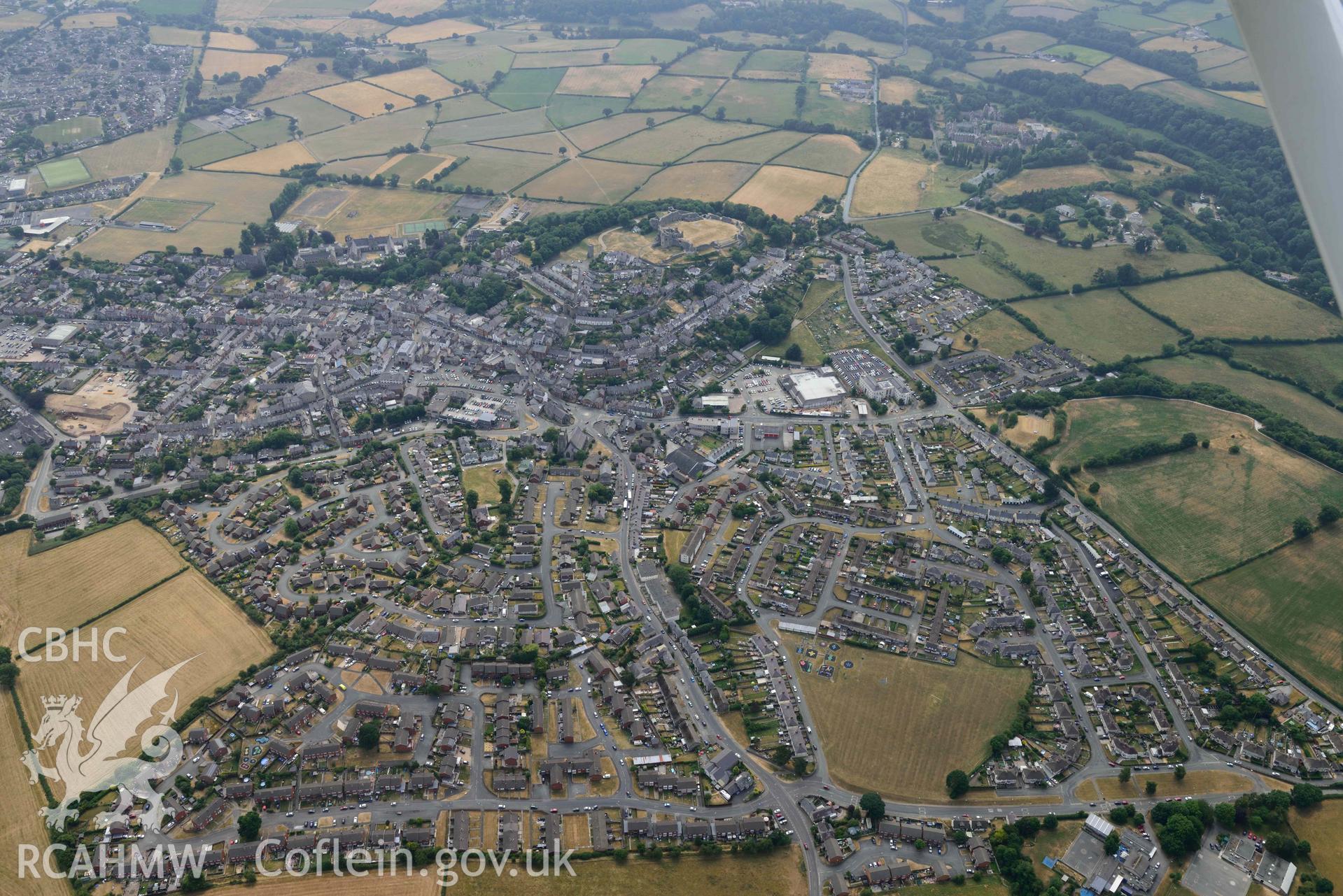 Denbigh Town and Castle with cropmarks from the south east. Oblique aerial photograph taken during the Royal Commission