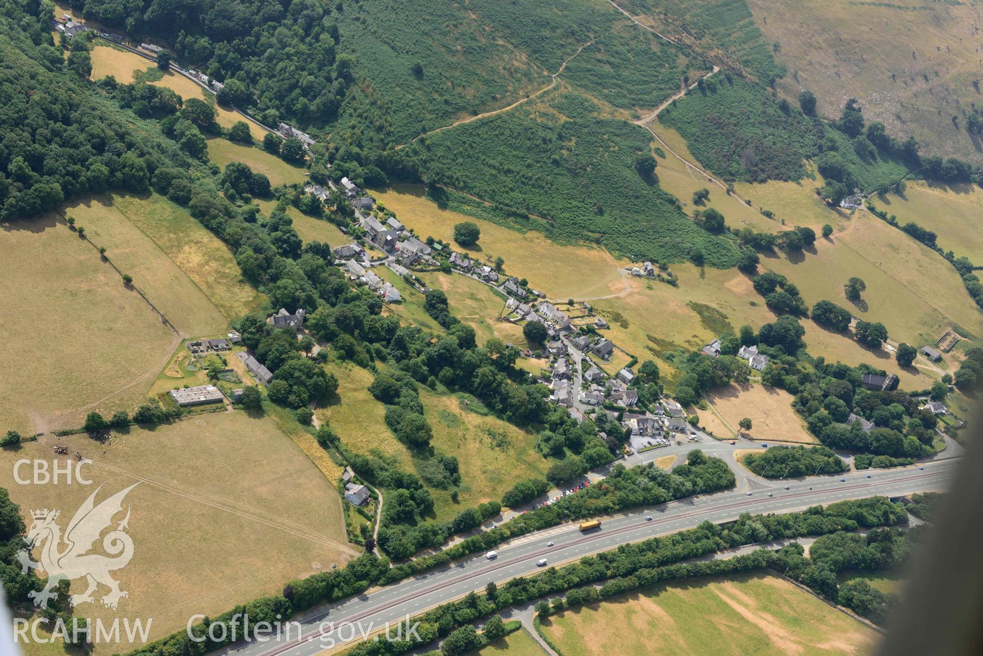 Abergwyngregyn and Aber Motte. Oblique aerial photograph taken during the Royal Commission’s programme of archaeological aerial reconnaissance by Toby Driver on 10 July 2018.