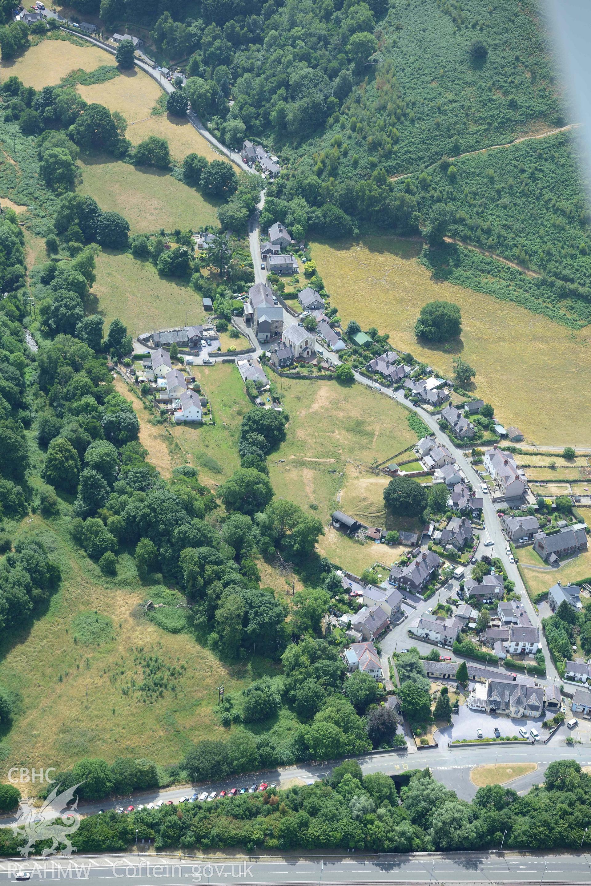 Abergwyngregyn and Aber Motte. Oblique aerial photograph taken during the Royal Commission’s programme of archaeological aerial reconnaissance by Toby Driver on 10 July 2018.