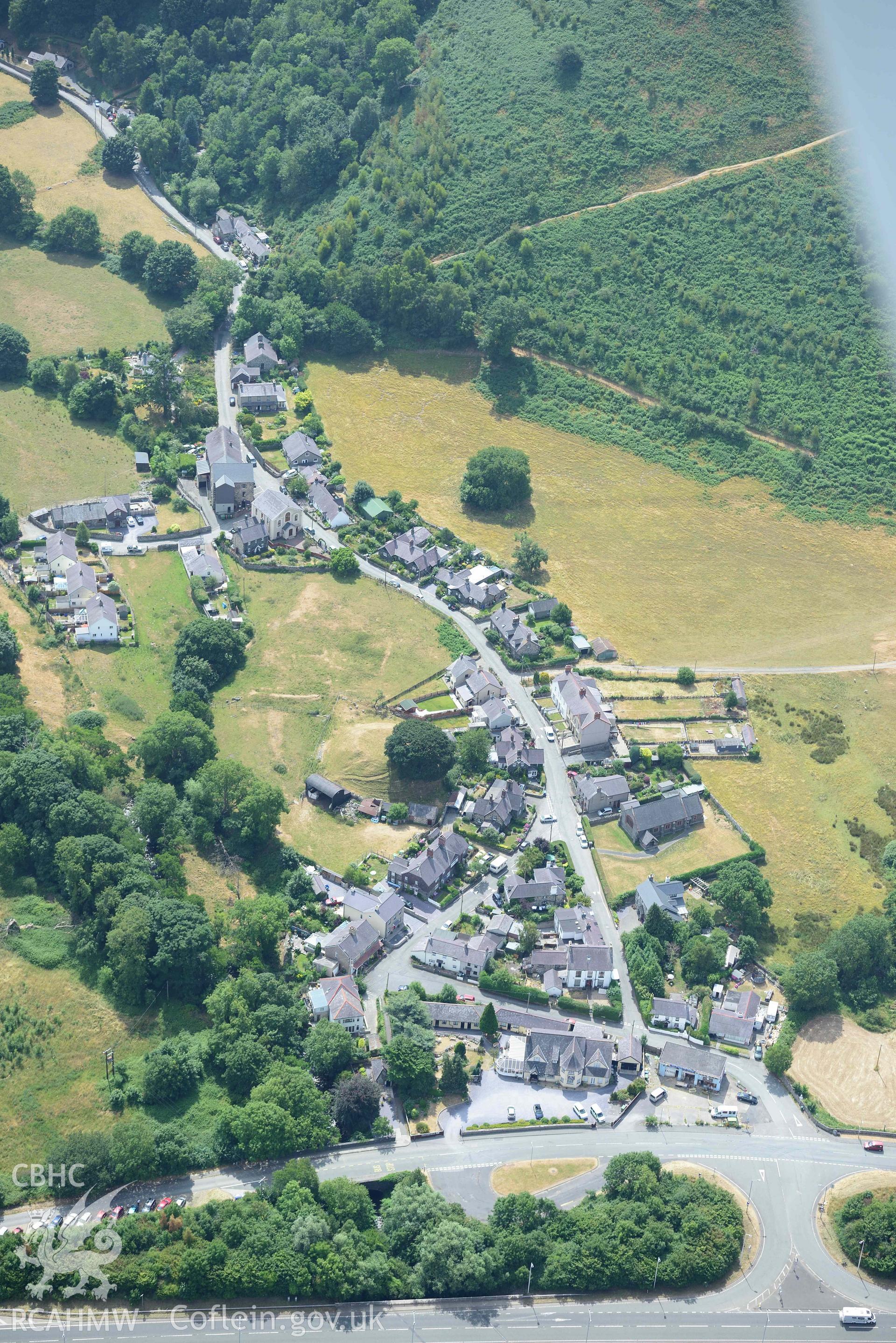 Abergwyngregyn and Aber Motte. Oblique aerial photograph taken during the Royal Commission’s programme of archaeological aerial reconnaissance by Toby Driver on 10 July 2018.