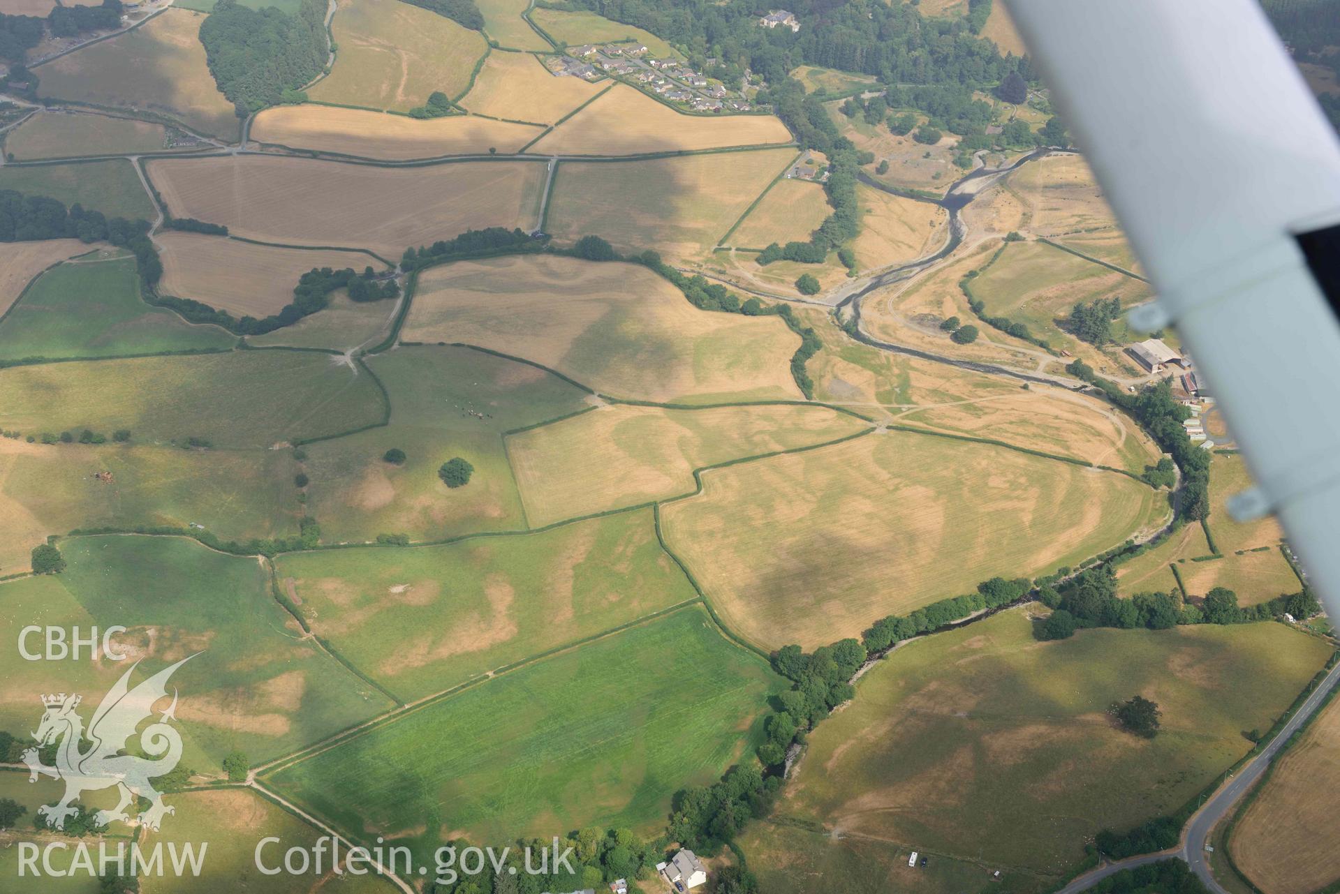 Parching near Llanidloes. Oblique aerial photograph taken during the Royal Commission’s programme of archaeological aerial reconnaissance by Toby Driver on 10 July 2018.