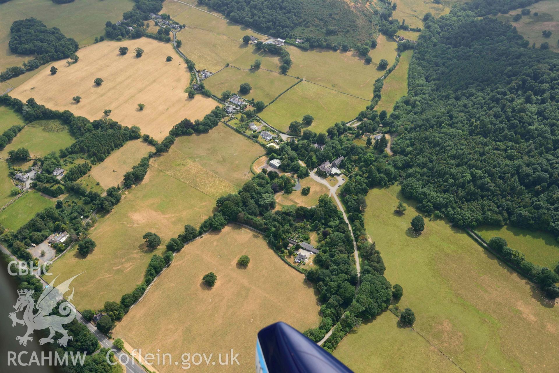 Gorddinog and Coed Gorddinog. Oblique aerial photograph taken during the Royal Commission’s programme of archaeological aerial reconnaissance by Toby Driver on 10 July 2018.