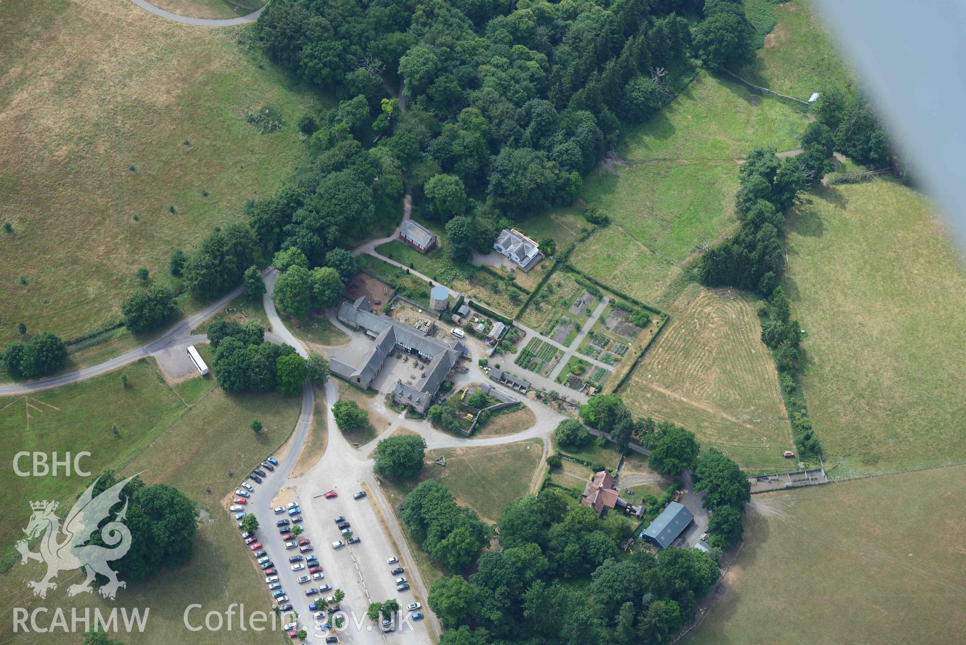 Farm buildings and kitchen garden at Chirk Castle. Oblique aerial photograph taken during the Royal Commission’s programme of archaeological aerial reconnaissance by Toby Driver on 10 July 2018.