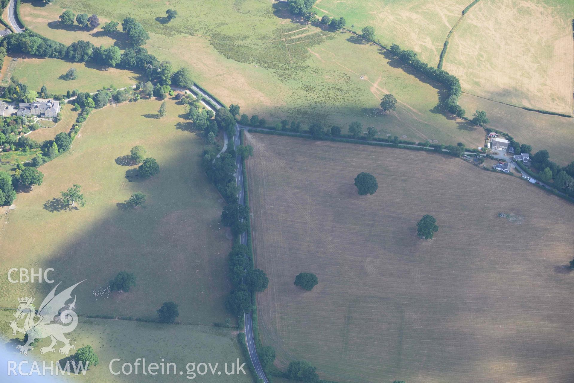 Site of gardens at Llanllyr. Oblique aerial photograph taken during the Royal Commission’s programme of archaeological aerial reconnaissance by Toby Driver on 10 July 2018.