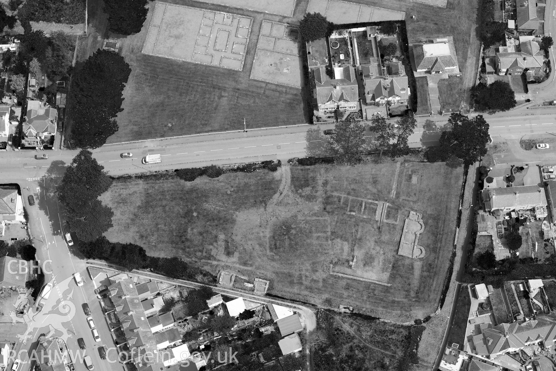 Segontium Roman Fort. Oblique black and white aerial photograph taken during the Royal Commission’s programme of archaeological aerial reconnaissance by Toby Driver on 10 July 2018.