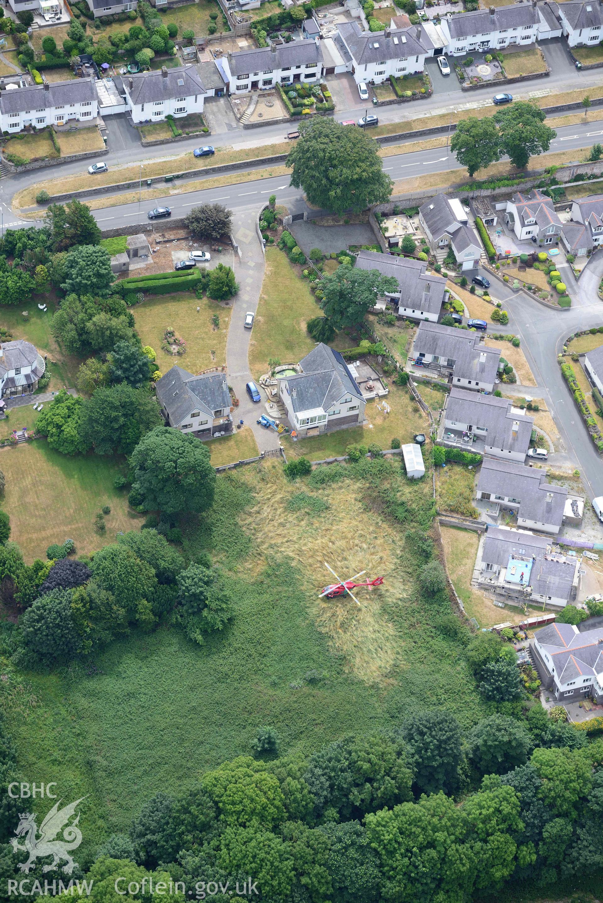 Air ambulance in Waterloo Port, Caernarfon. Oblique aerial photograph taken during the Royal Commission’s programme of archaeological aerial reconnaissance by Toby Driver on 10 July 2018.