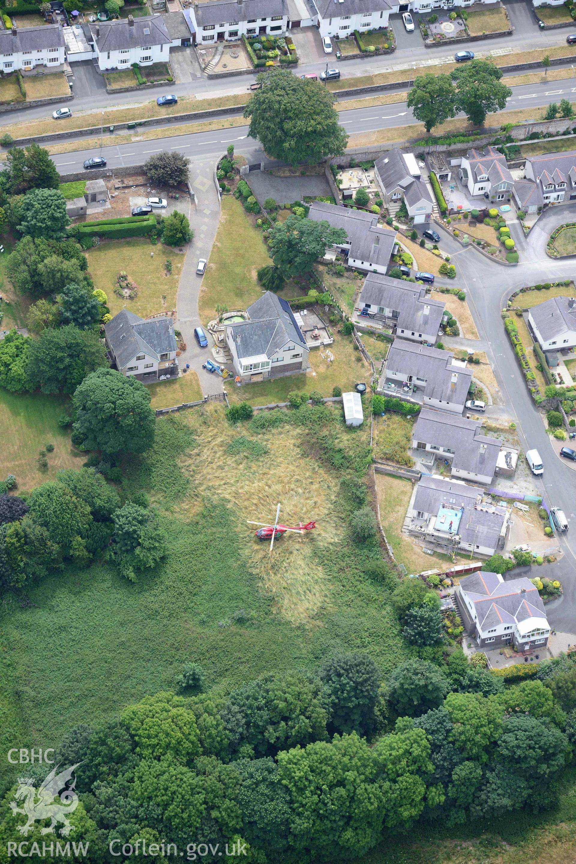 Air ambulance in Waterloo Port, Caernarfon. Oblique aerial photograph taken during the Royal Commission’s programme of archaeological aerial reconnaissance by Toby Driver on 10 July 2018.